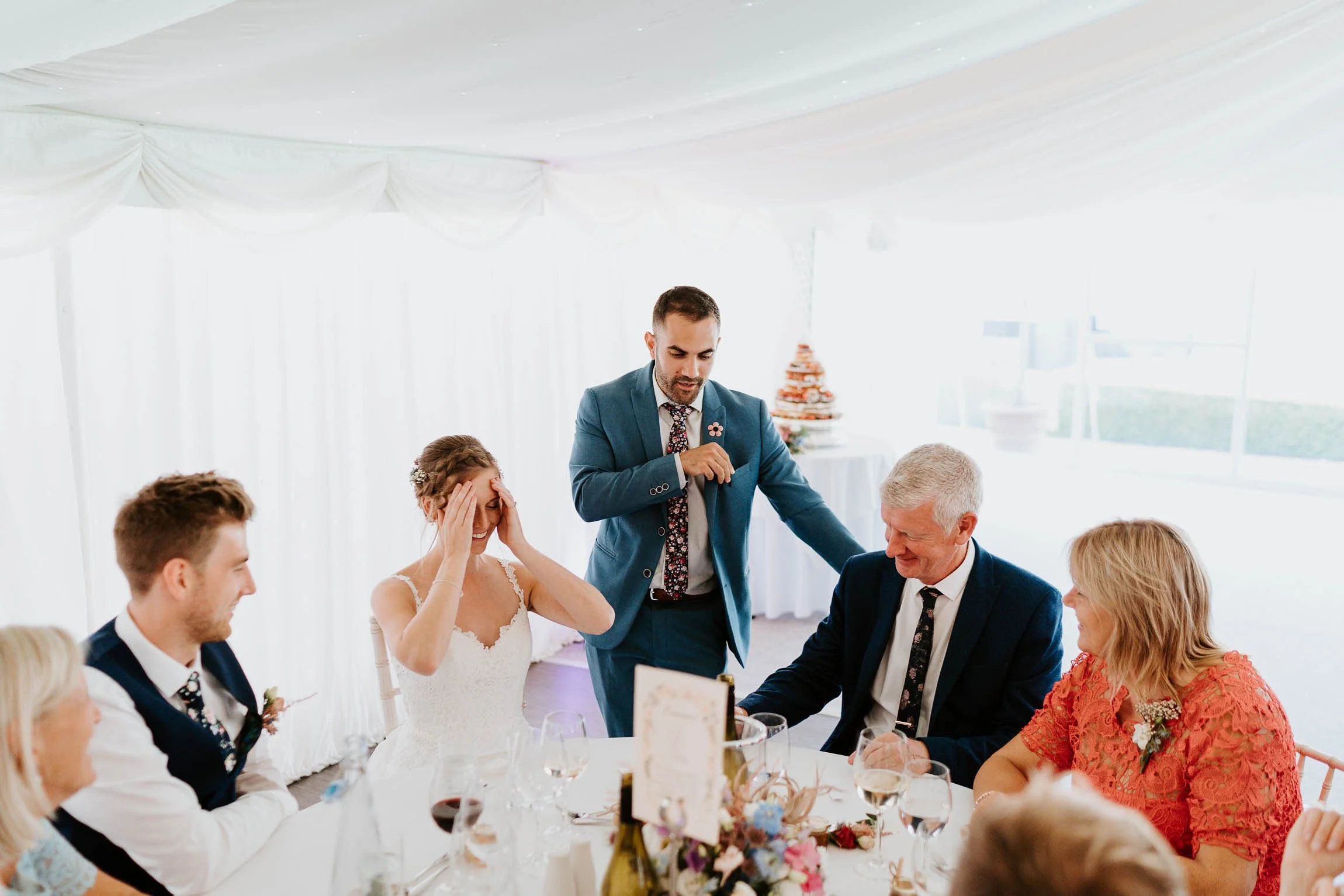 Magical host Alfie entertaining the top table during a wedding breakfast in the Parley Manor marquee