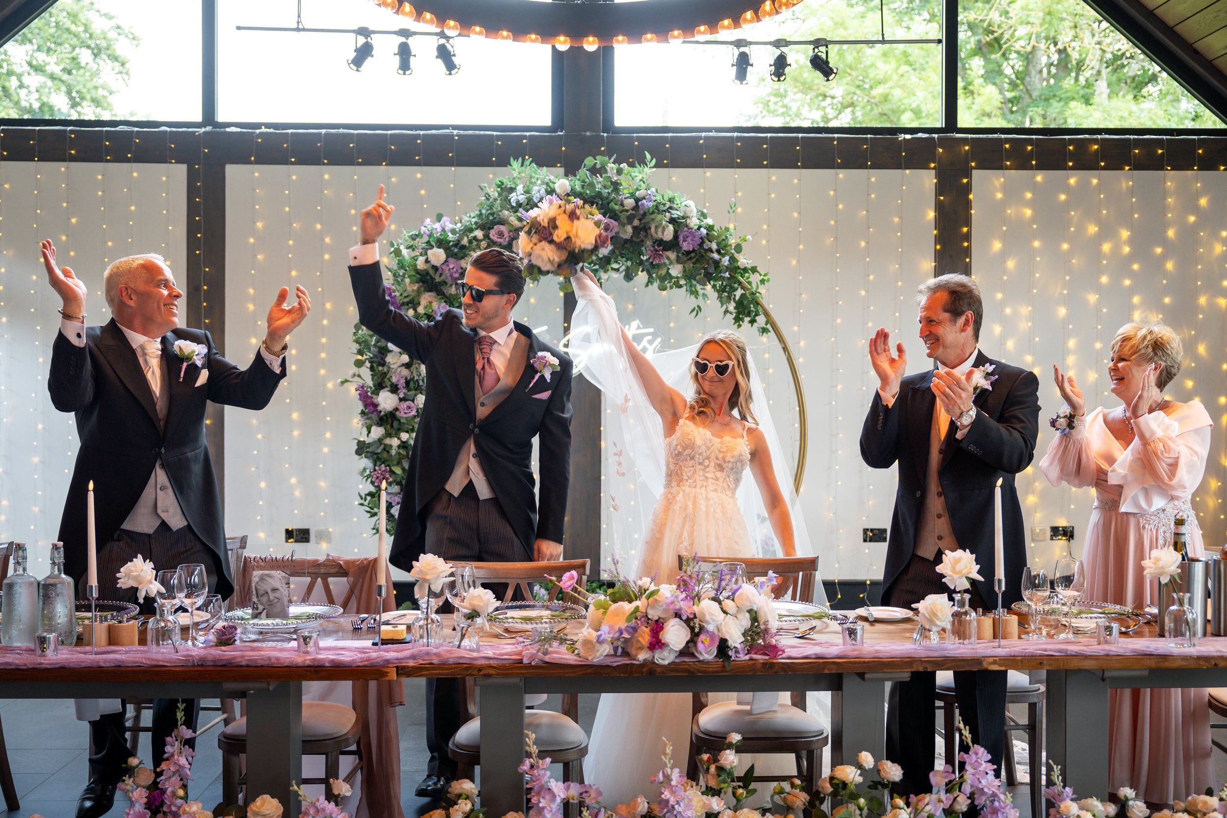 Guests on the top table dancing following their grand entrance into the room