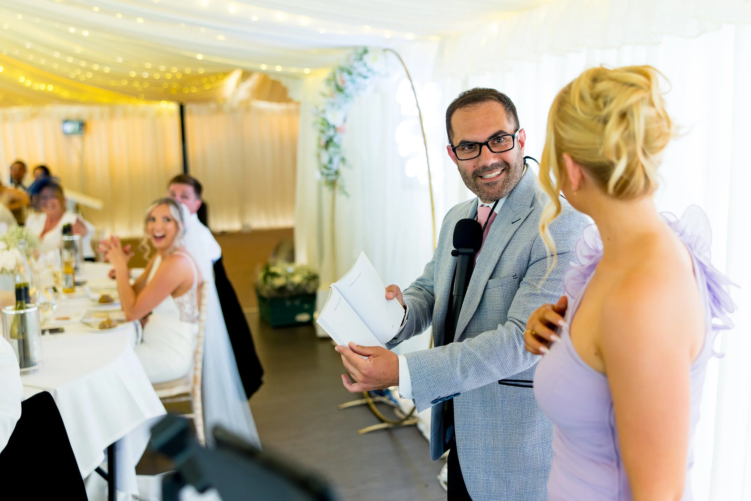 Wedding host and MC Alfie introducing the speeches inside the Parley Manor marquee
