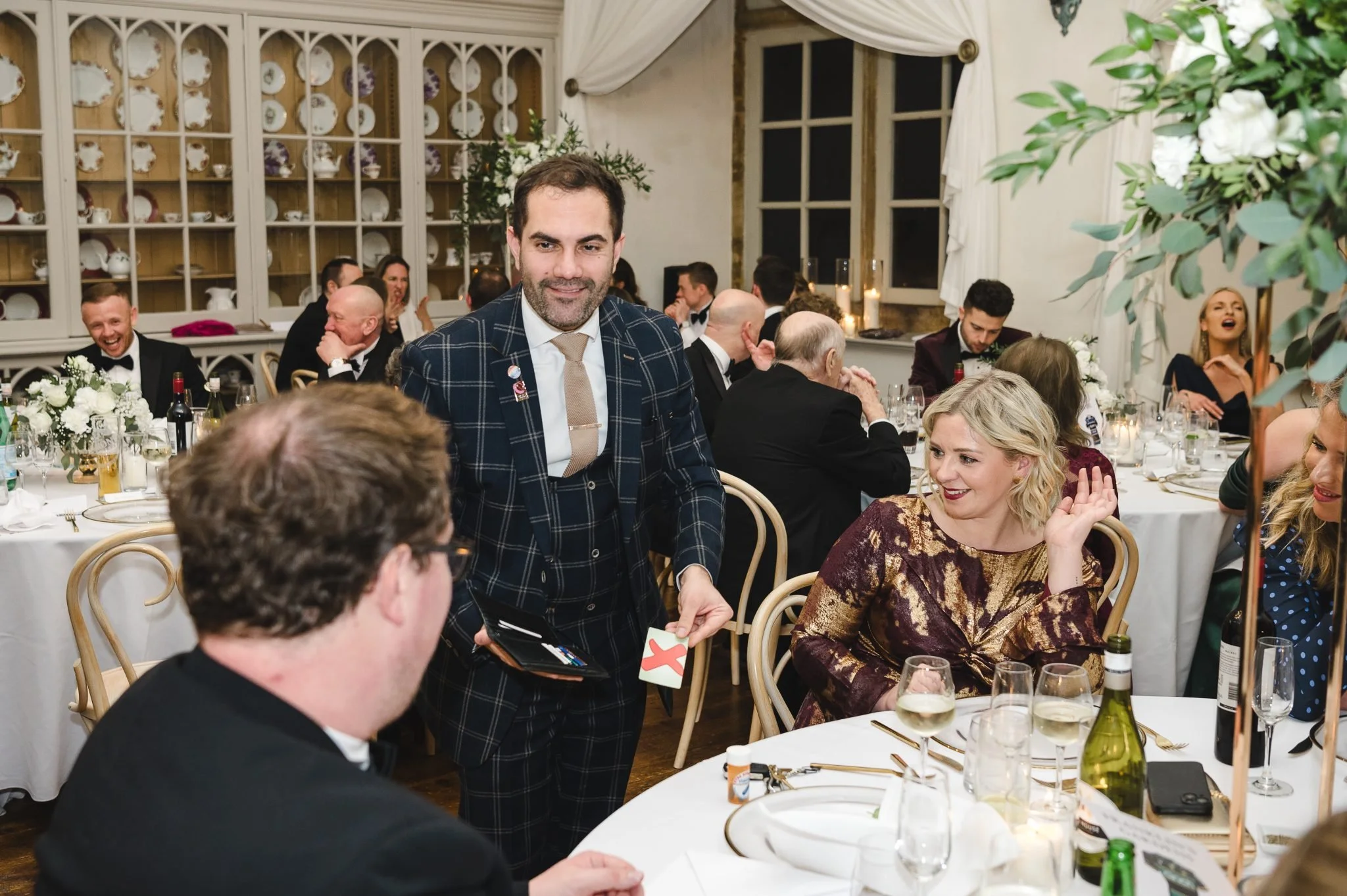 Magician Alfie entertaining guests during the wedding breakfast with his table magic