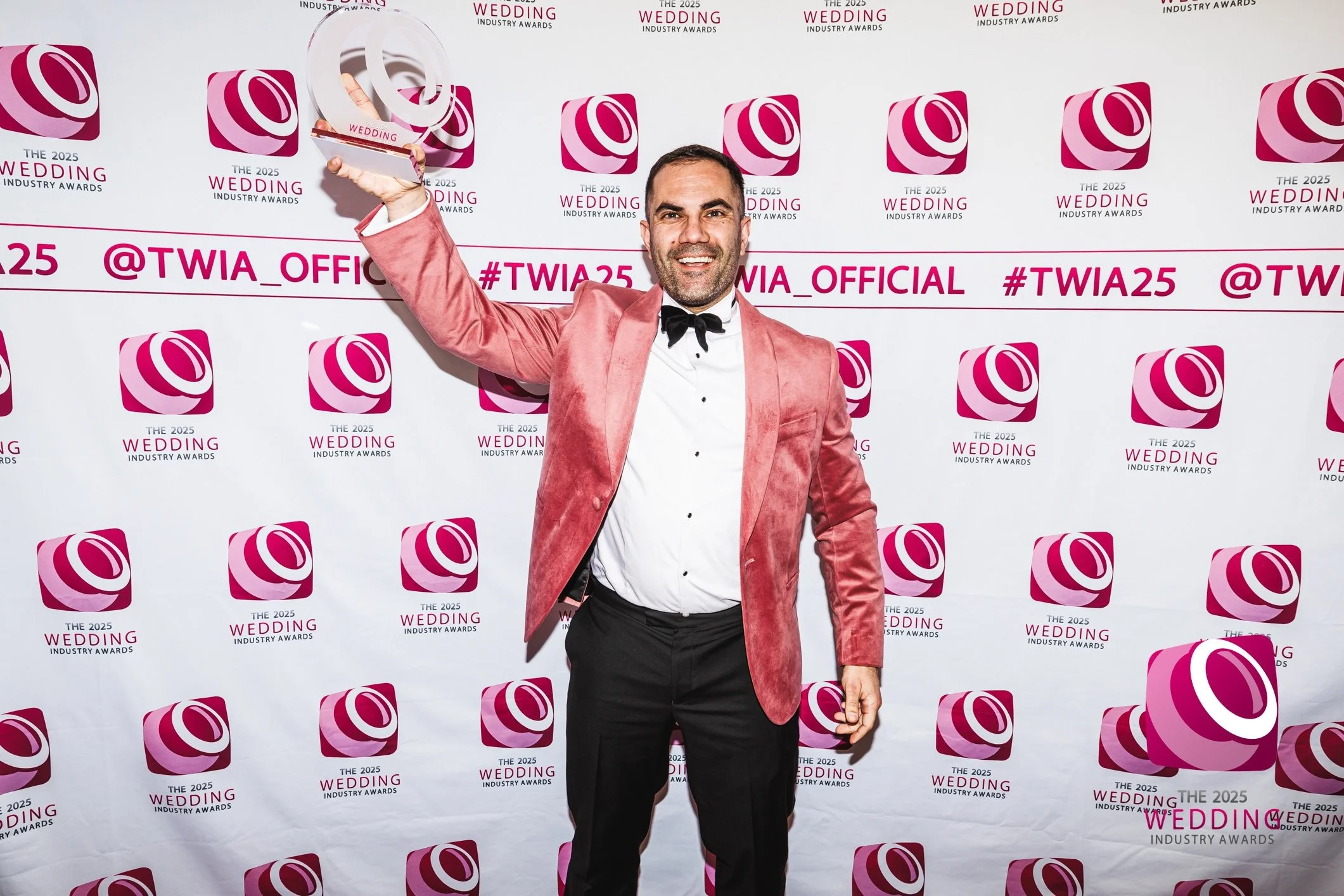 Magic by Alfie holding his trophy at the 2025 Wedding Industry Awards