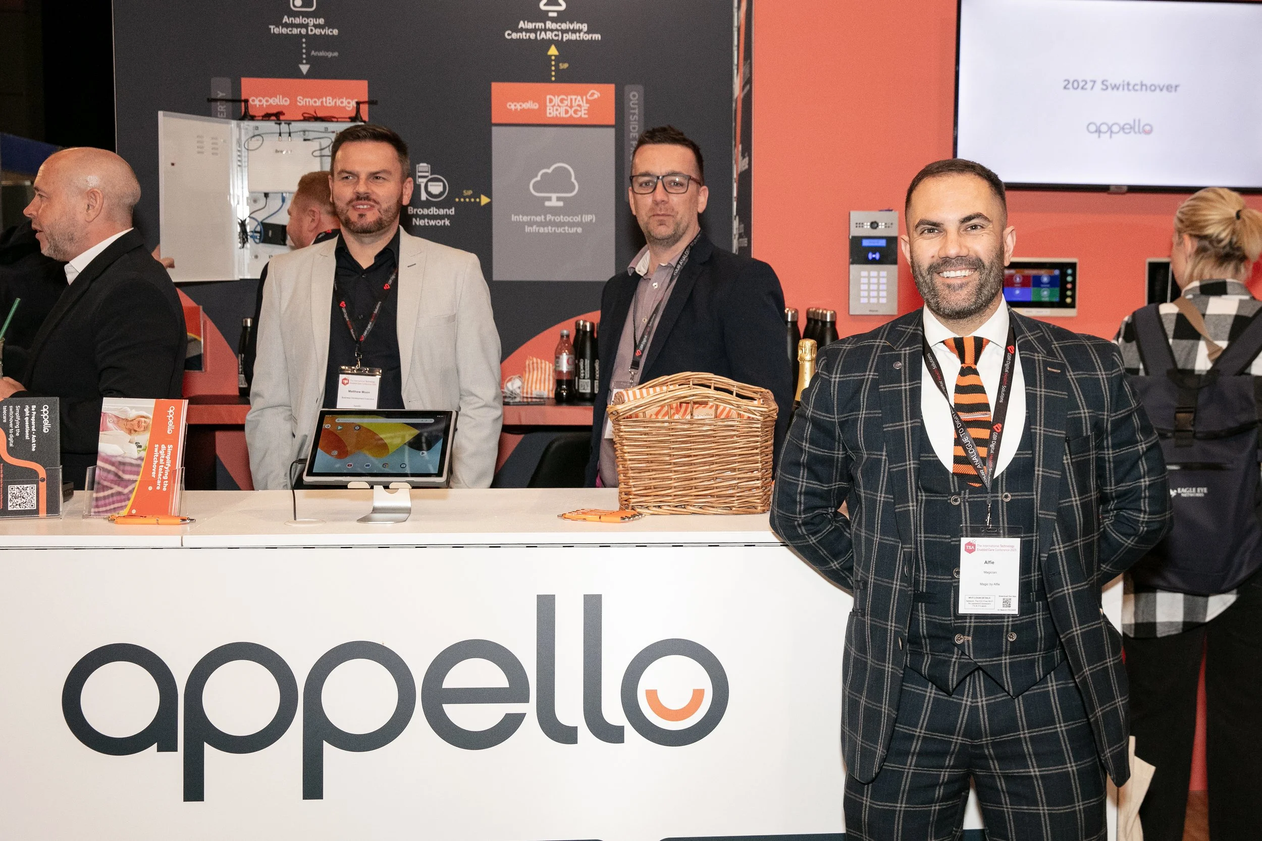 Professional trade show environment with corporate entertainment supporting visitor engagement