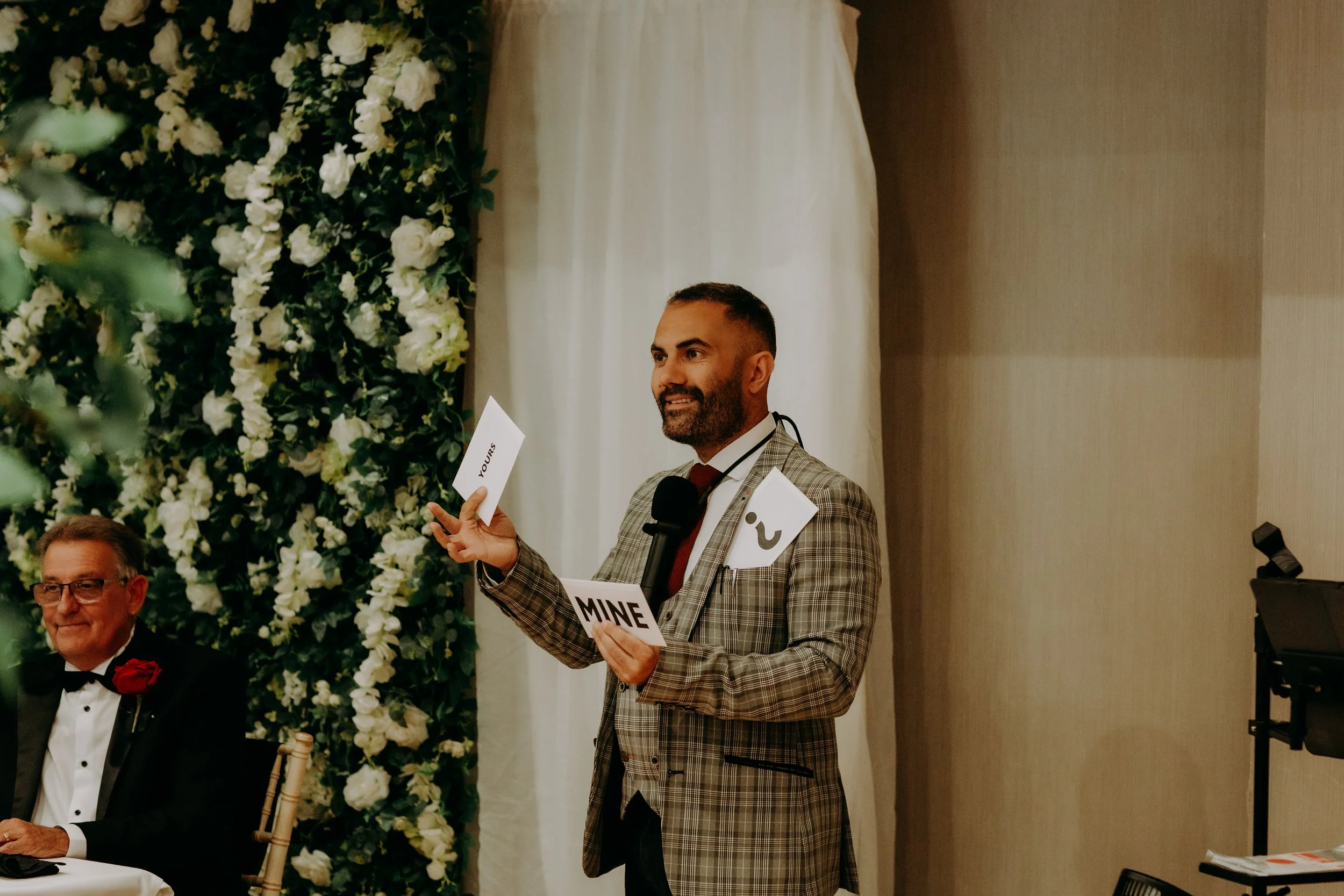 Alfie performing his cabaret magic show in front of an audience at a wedding