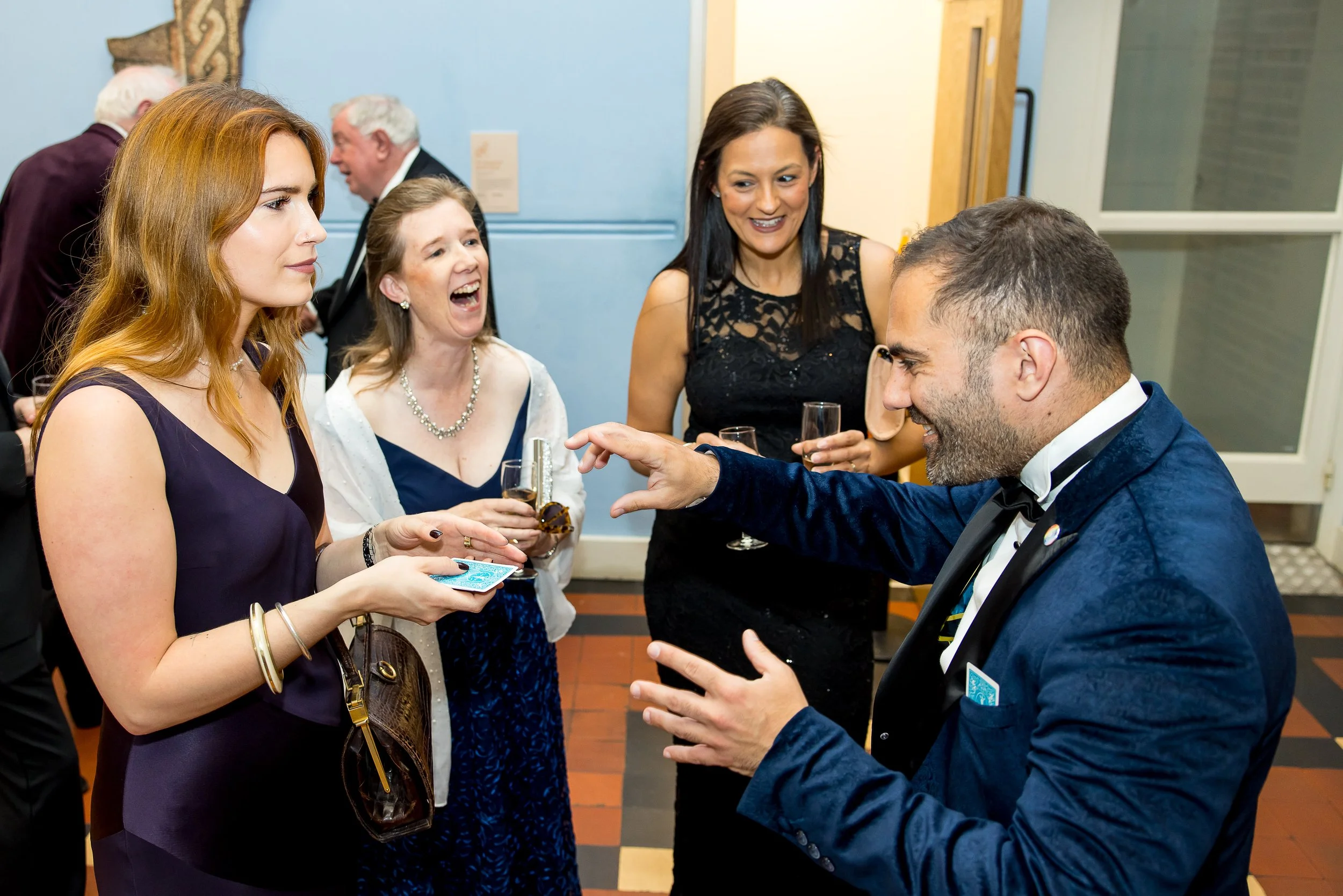 Corporate event magician performing mentalism at a business event