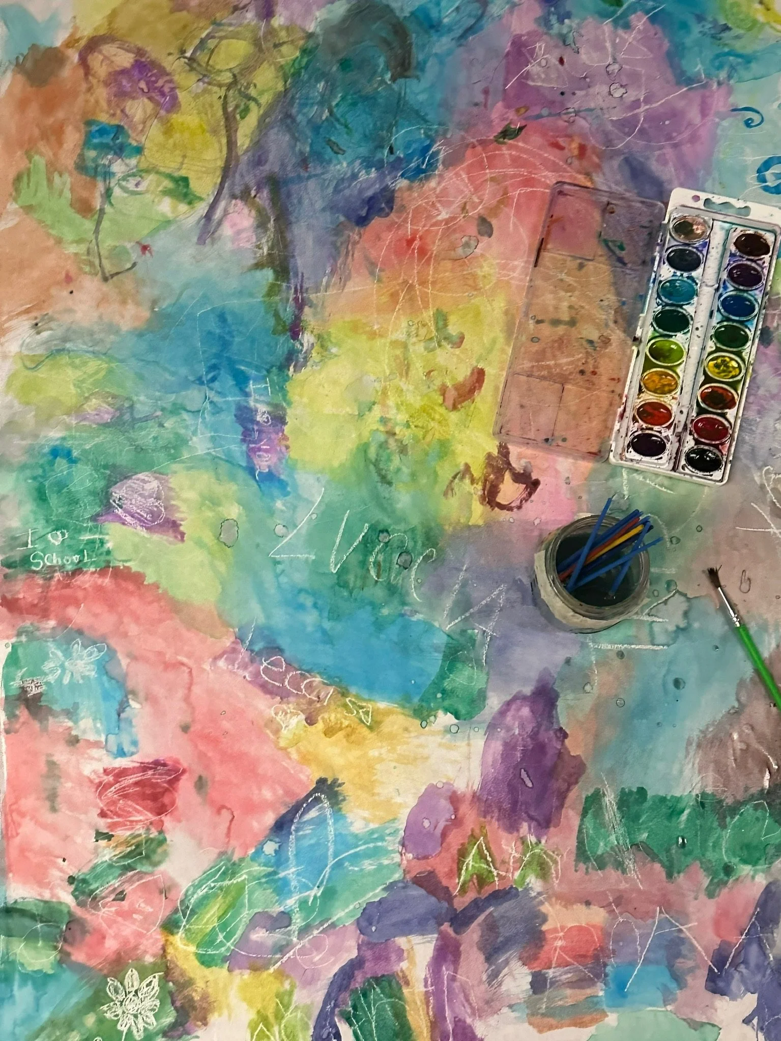 "Collaborative Watercolor Experiment" by 1st grade artists.
