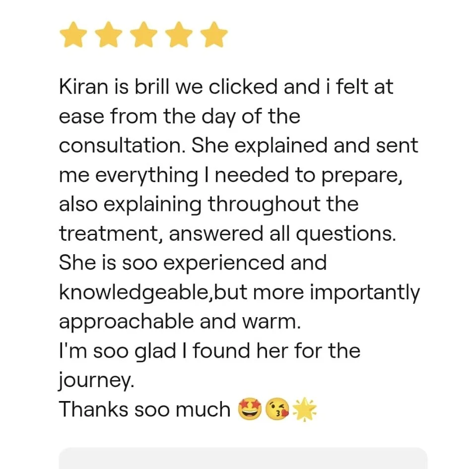 Five gold stars followed by a positive review in black text expressing satisfaction with a professional called Kiran, mentioning her expertise, helpfulness, warmth, and thorough explanations during a consultation. The review ends with cheerful emojis.