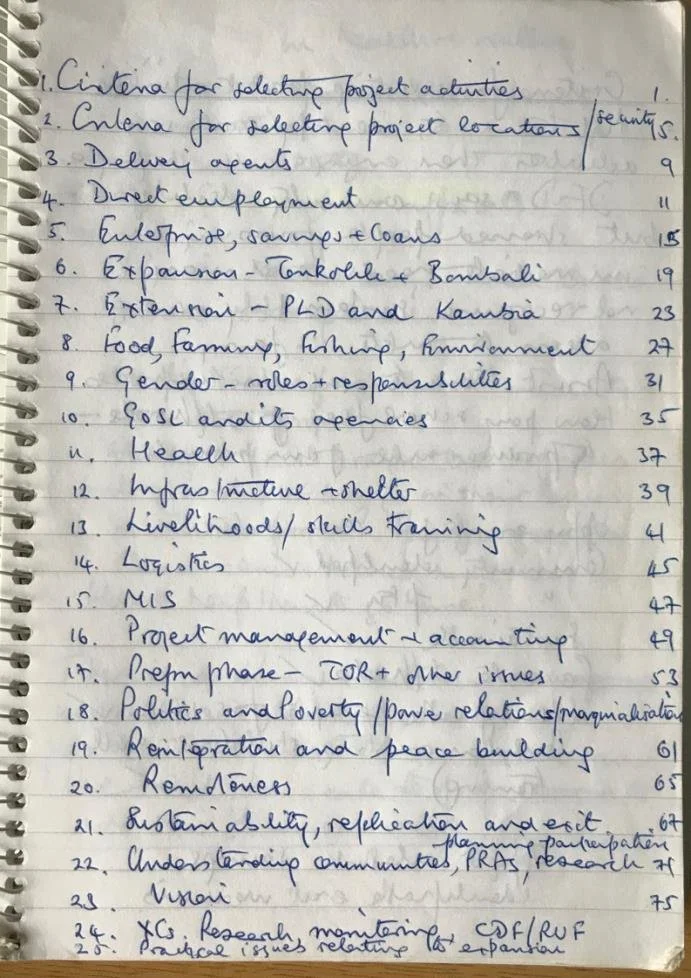 a page in a notepad with a numbered list from 1 to 25