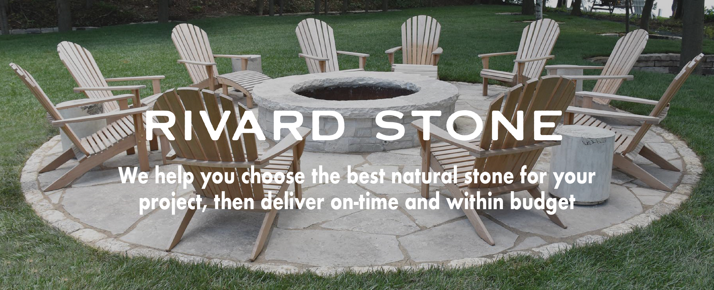 Outdoor patio with a circular stone fire pit surrounded by seven wooden Adirondack chairs on a stone surface, with grass and trees in the background.