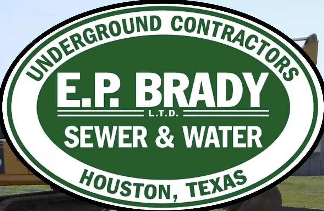 Green and white oval sign for E.P. Brady Sewer & Water, underground contractors in Houston, Texas.