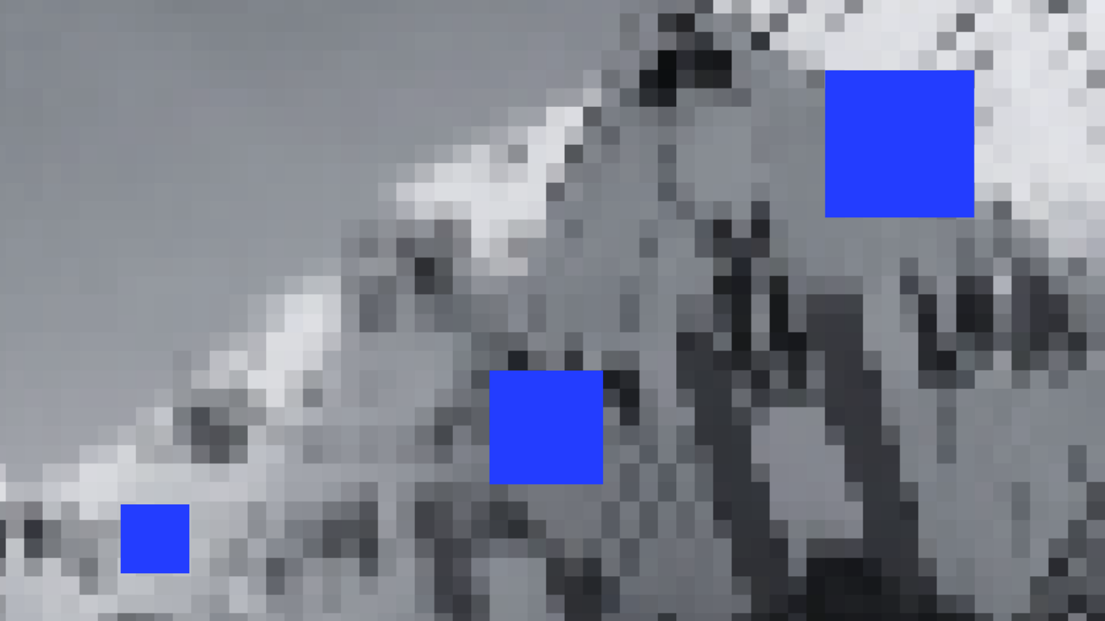 Verpixeltes Bild der Kubushäuser in Rotterdam mit blauen Markierungen der Fenster