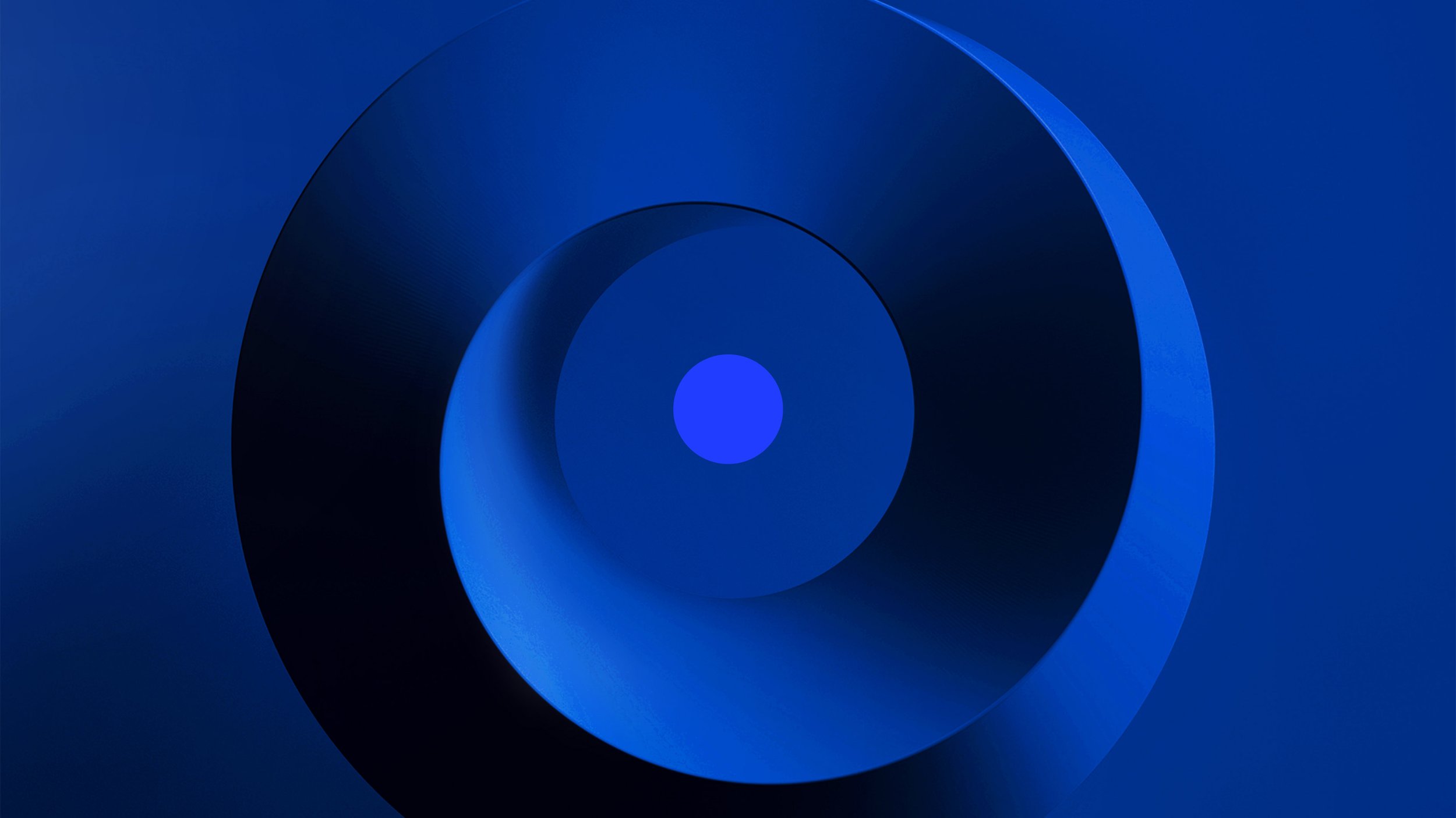 Abstraktes Design mit blauen und schwarzen Kreisen in einer spiralförmigen Anordnung.