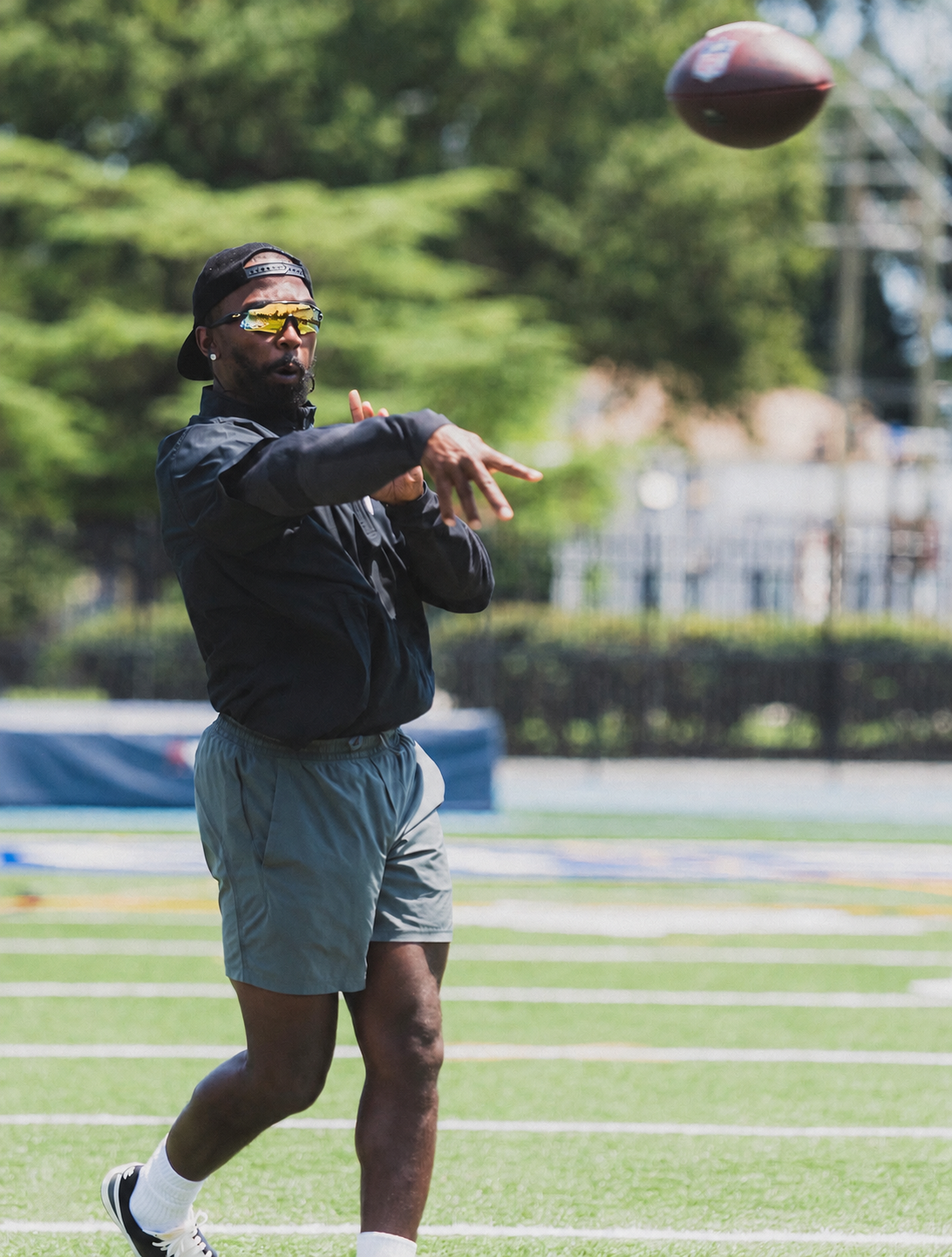 Tyrod Taylor demonstrating a pass at the academy.