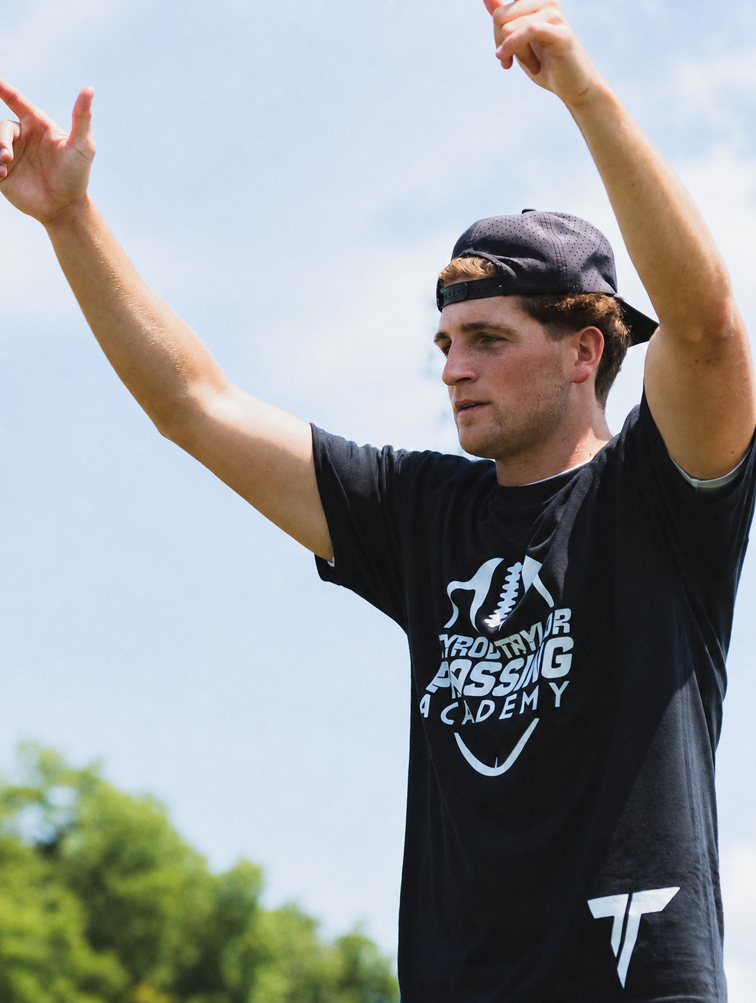 An academy participant practicing on the field.