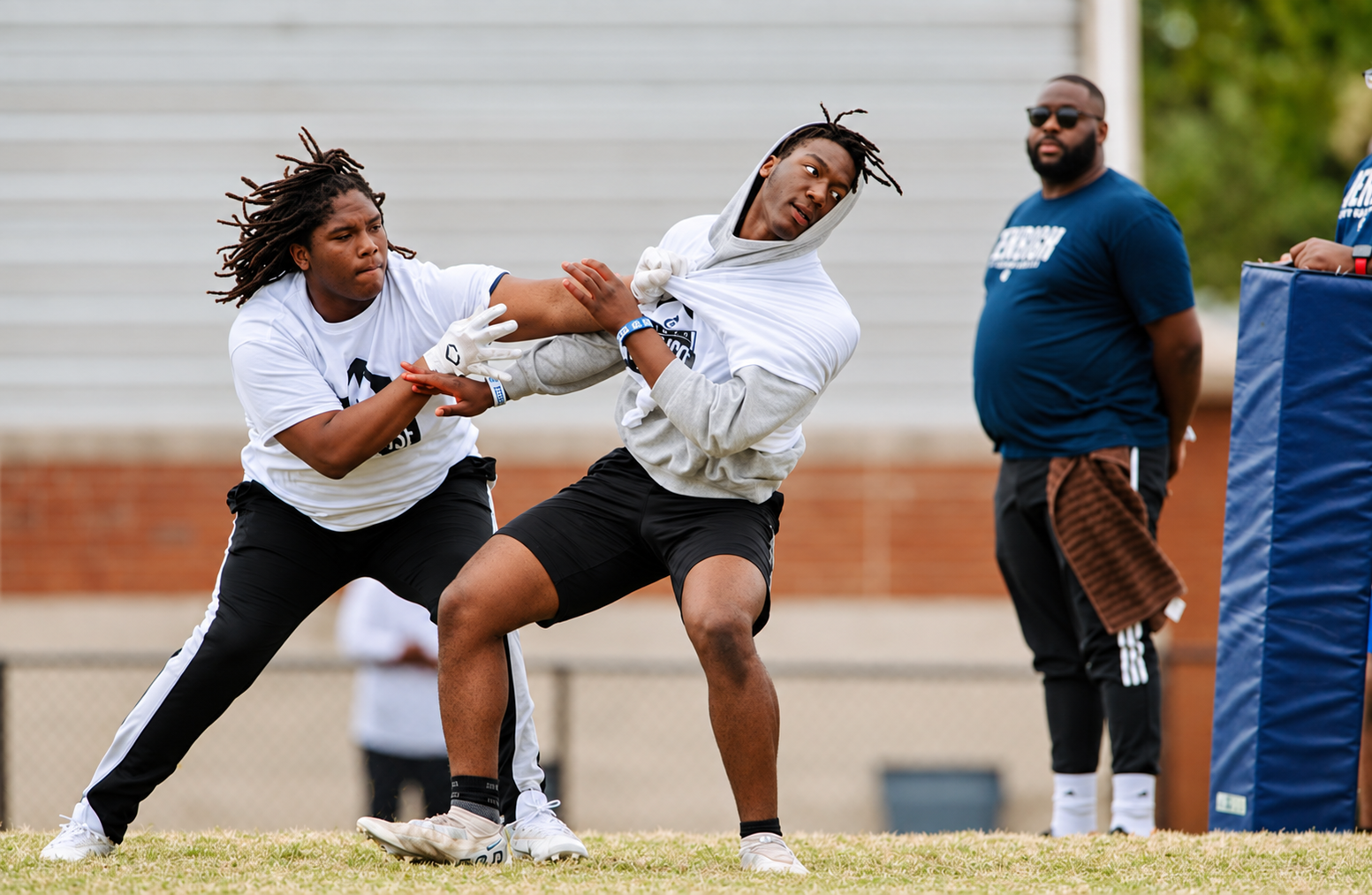 Athletes competing in a passing drill at the 2023 Peninsula Showcase.