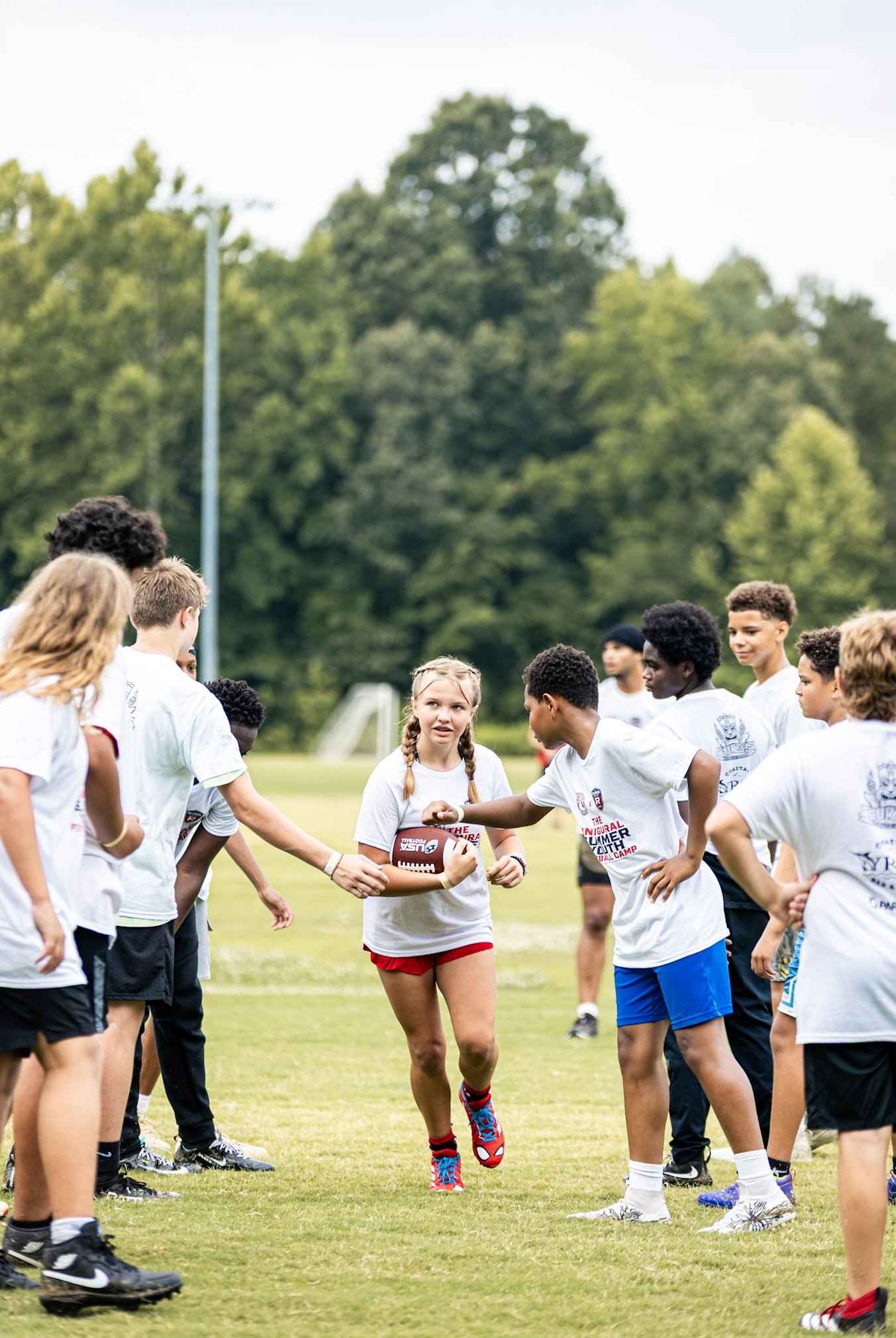 Young athletes gathering at the Foundation Youth Football Camp in Gloucester, Virginia.