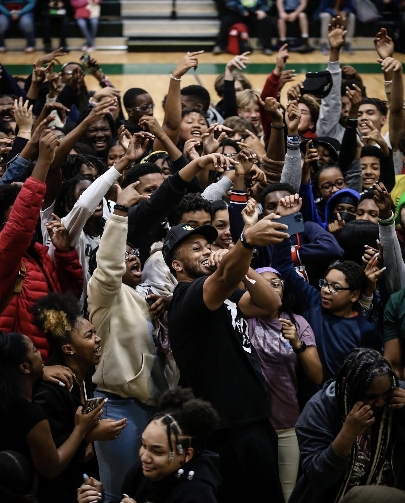 Tommy Reamon with young people at a community gathering