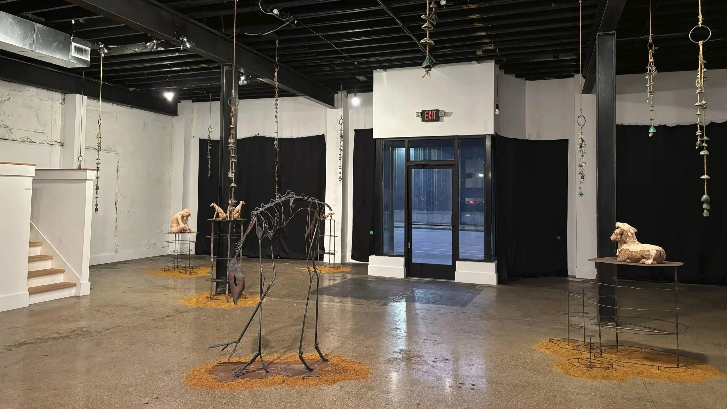 Gabriel Skinner's gallery space in 'Odds and Ends,' the University of Memphis Fall 2025 Senior BFA thesis group exhibition held at The Ugly Art Company in Memphis. Works visible include 'Tread Lightly,' 'Still,' 'Vigil,' 'Begin,' 'Hide,' and 'Call.'