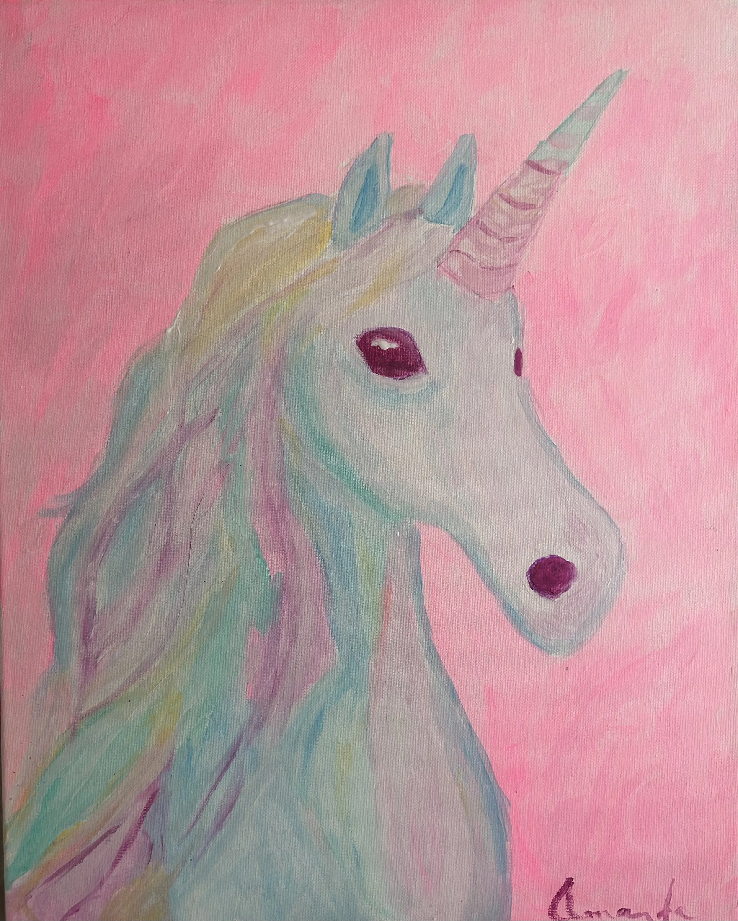 A colorful painting of a unicorn with a pink background, featuring a light-colored face, darker pink eyes, and a pink and blue horn. The unicorn's mane has pastel shades of yellow, blue, pink, and purple.