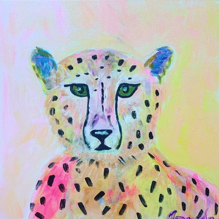Quiet Strength: This cheetah is painted with soft pastels and expressive markings, balancing gentleness with quiet power. 