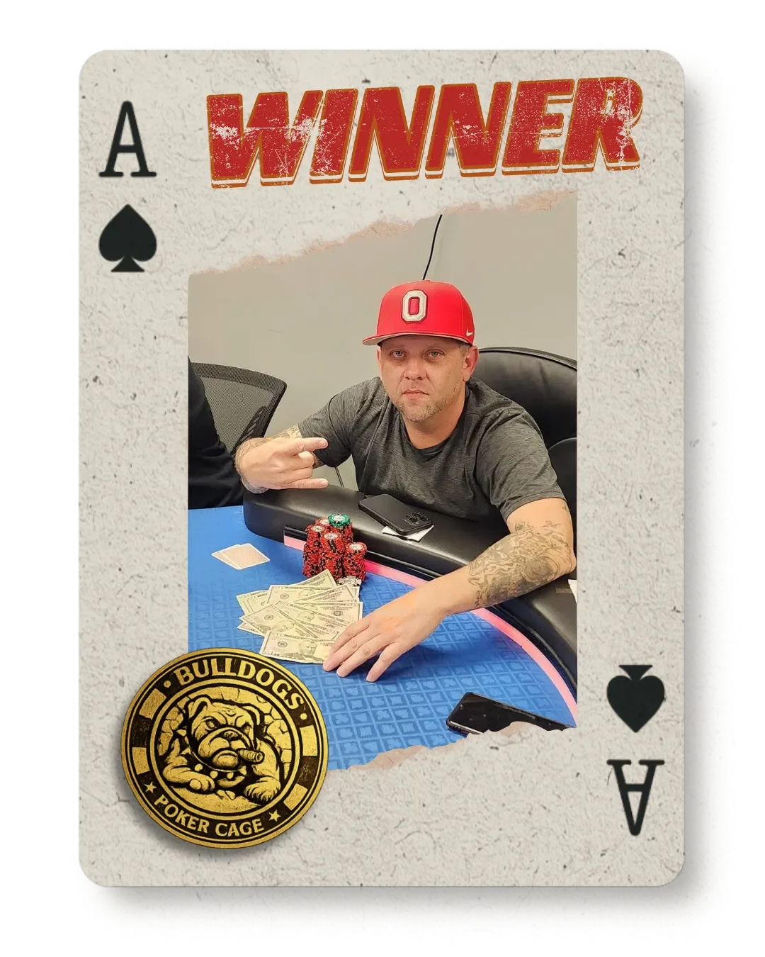 Man sitting at a poker table with poker chips, cash, and a phone. He is wearing a red Ohio State baseball cap and making a hand gesture. The image is framed as a playing card with the word 'WINNER' at the top and a Bulldogs poker cage logo at the bottom.