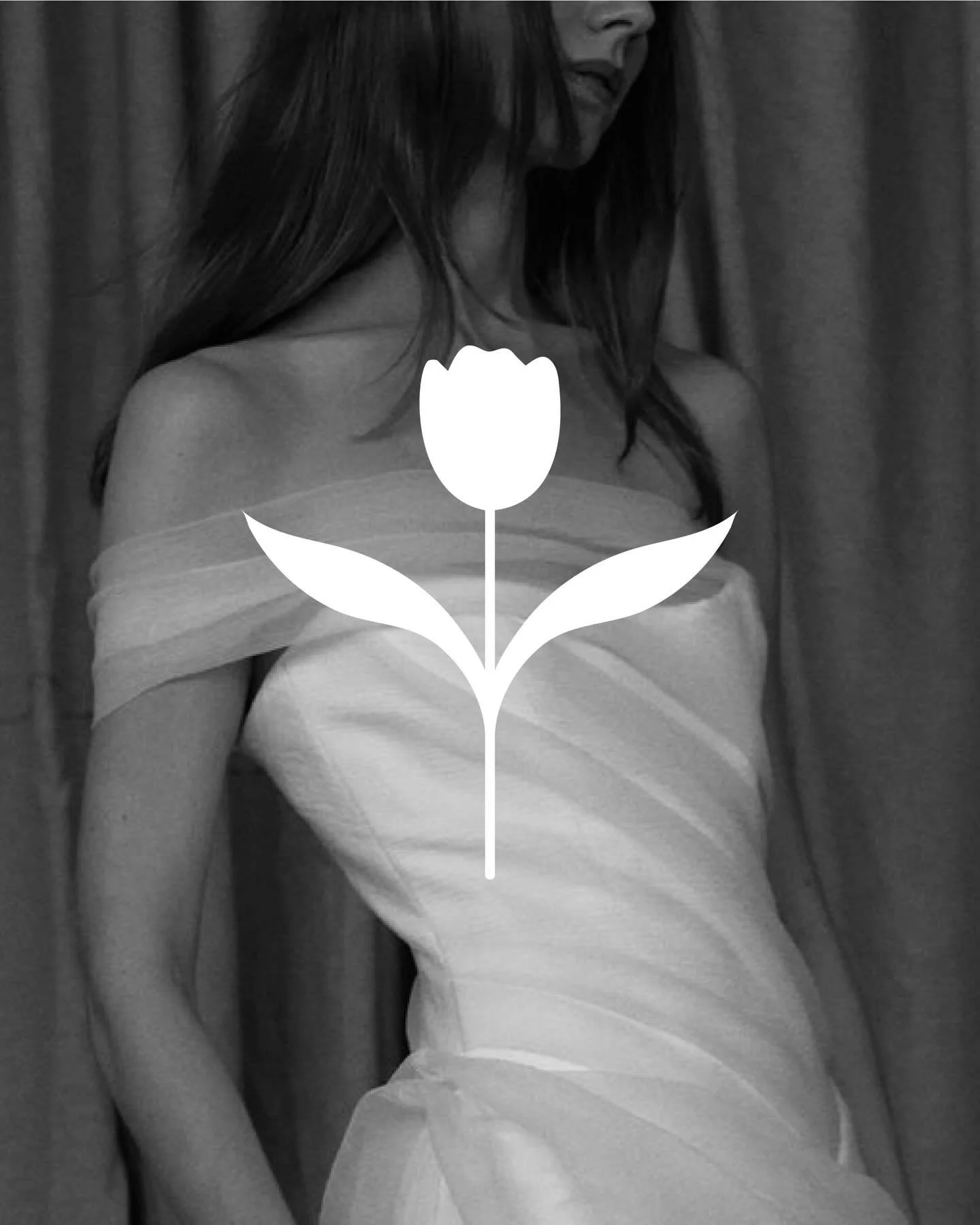 A further evolution of the WT Stacks monogram for @whitetulipbridal, the icon abstracts the initials into a tulip form. The bloom references the curves of the W, while the leaves extend from the crossbar structure of the T, translating the monogram i