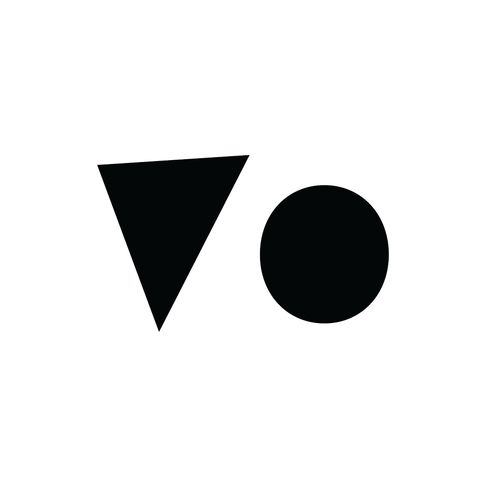 Black silhouette of a downward-pointing triangle and a circle with the word "OR" between them.