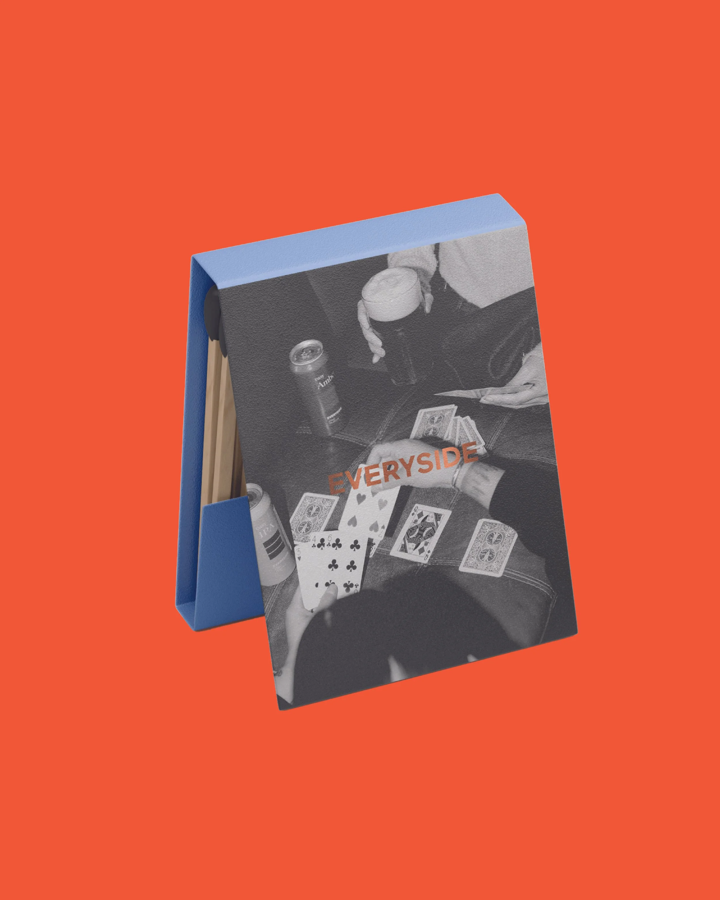 A menu card with a black and white photo of people playing cards and drinking, with the word "EVERYDAY" in bold orange letters on the front, placed on an orange background.