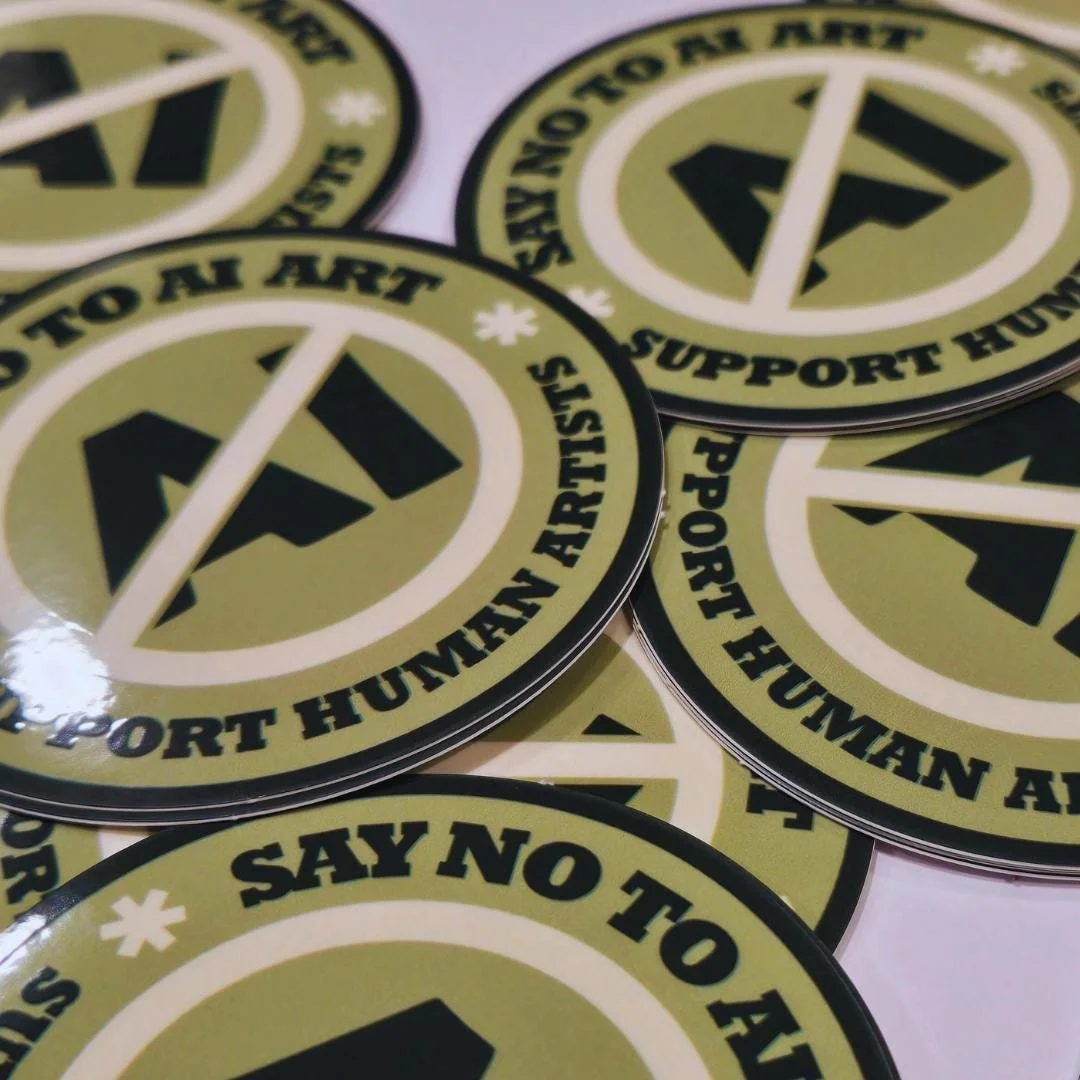 Anti AI art sticker viewed at an angle showing many of them in a mess