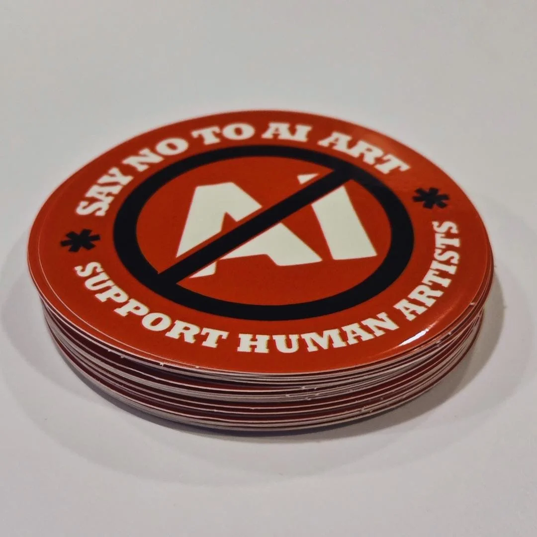 side view of the red anti AI art sticker