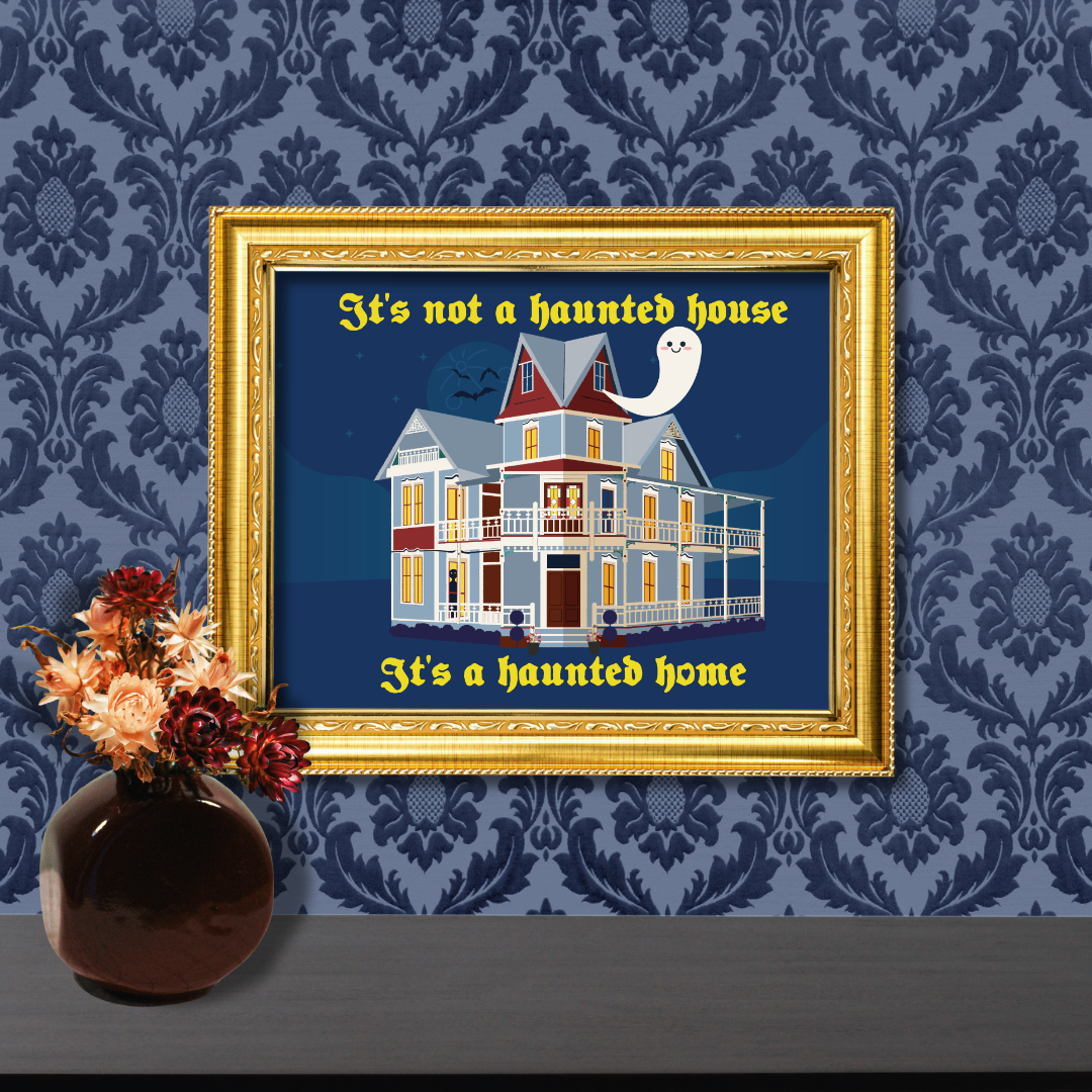 image of the haunted house illustration inside a frame to mock up how it would look on the wall in someone's home.