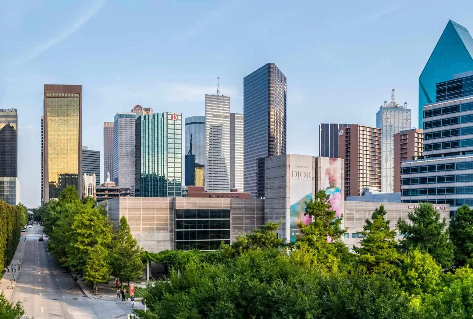 Wide angle commercial real estate photography of the Downtown Dallas skyline at dusk, by C Ray Pictures.