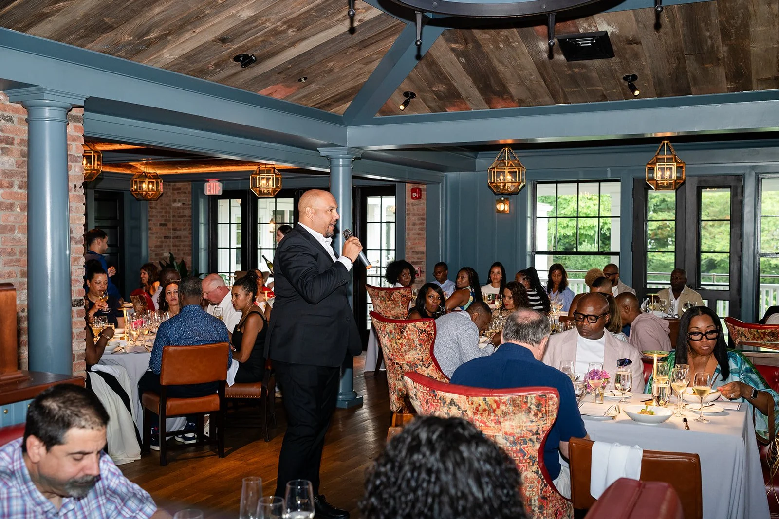 TJ Douglas presenting wine education at a large food festival as a keynote speaker and sommelier