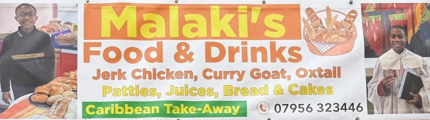A colorful sign for Malaki's Food & Drinks restaurant.  The sign lists menu items including jerk chicken, curry goat, oxtail, patties, juices, bread, and cakes, with a green banner indicating Caribbean take-away. The phone number is also displayed.