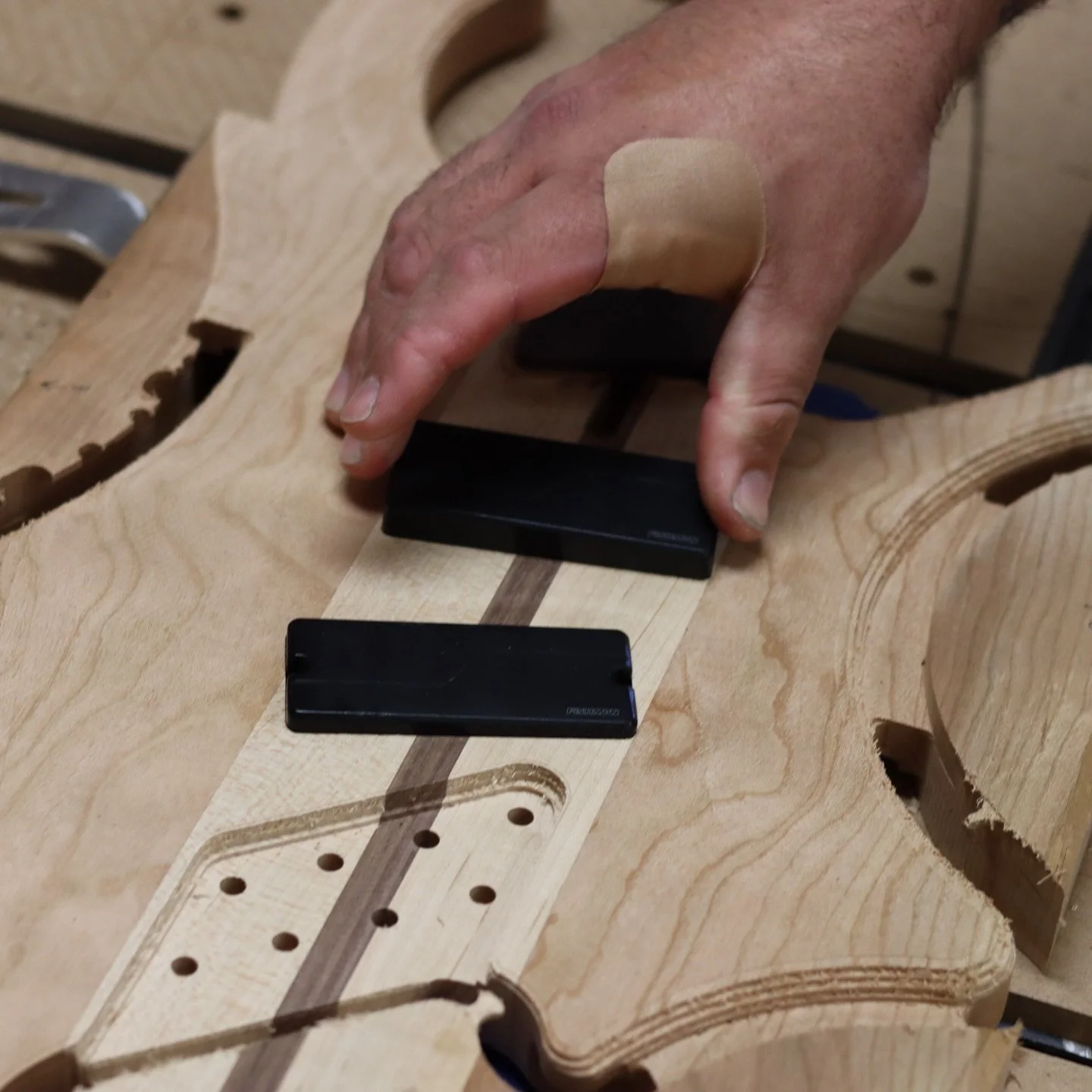 Zak decided to machine his own guitar body. Starting by machining the clamps to hold it. Then he made the guitar. After that he was cutting boat seat upholstery with another member, swapping in a @altitudecraft.official drag knife to do it.

All on t