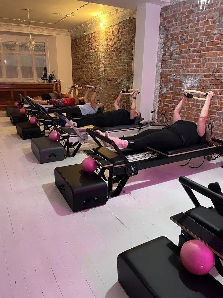 People participating in a Pilates class