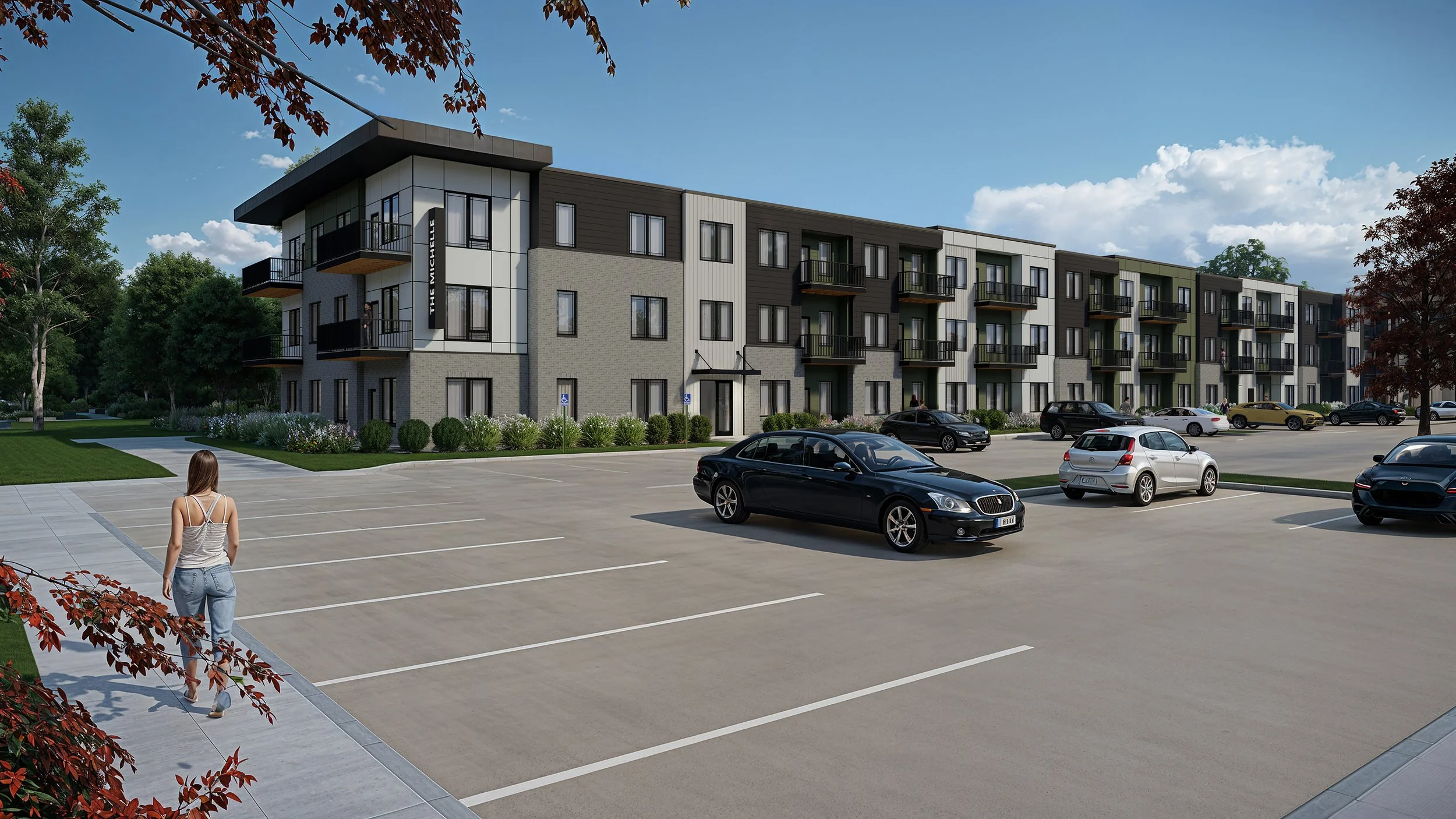 Modern multi-story apartment building with a parking lot in front, several parked cars, and a woman walking on the sidewalk. The building has balconies and a sign reading 'The Micalle'.