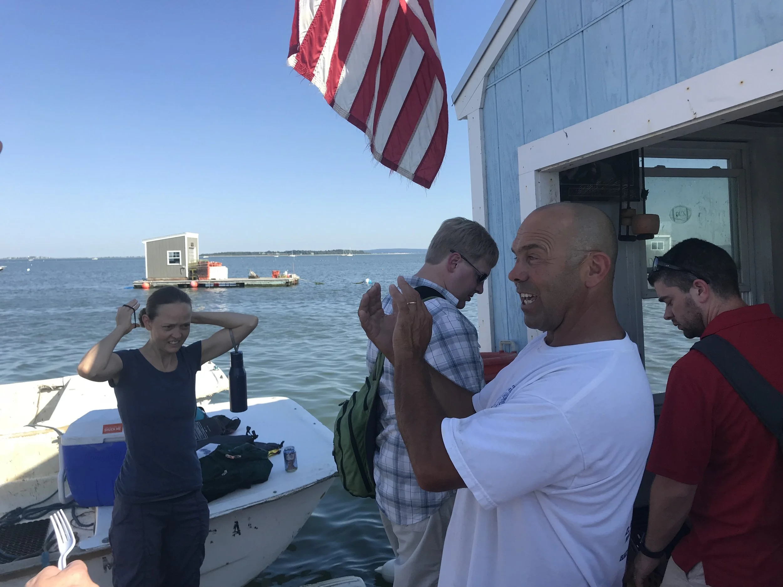 Private Corpprate Group visiting a Massachusetts oystrer farm with Bosotn Private Tours