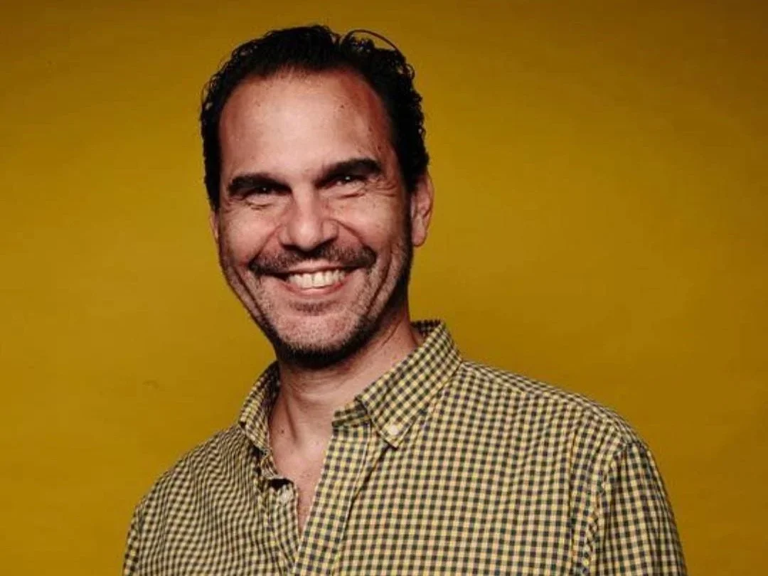 Experienced international Private Tours guide smiling in professional head shot