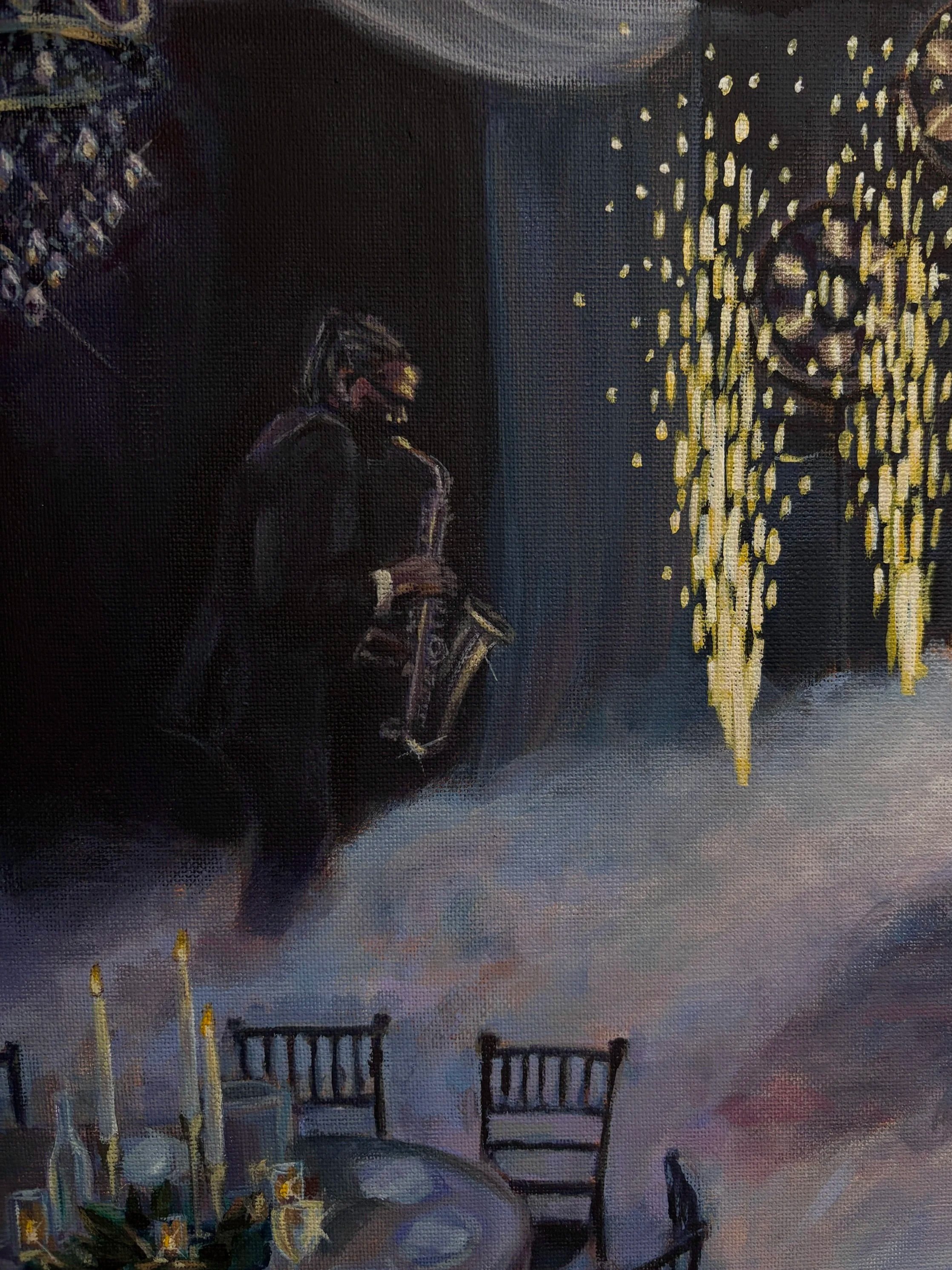 Saxaphone player playing at a dimly lit venue with a table set with candles and chairs in the foreground.