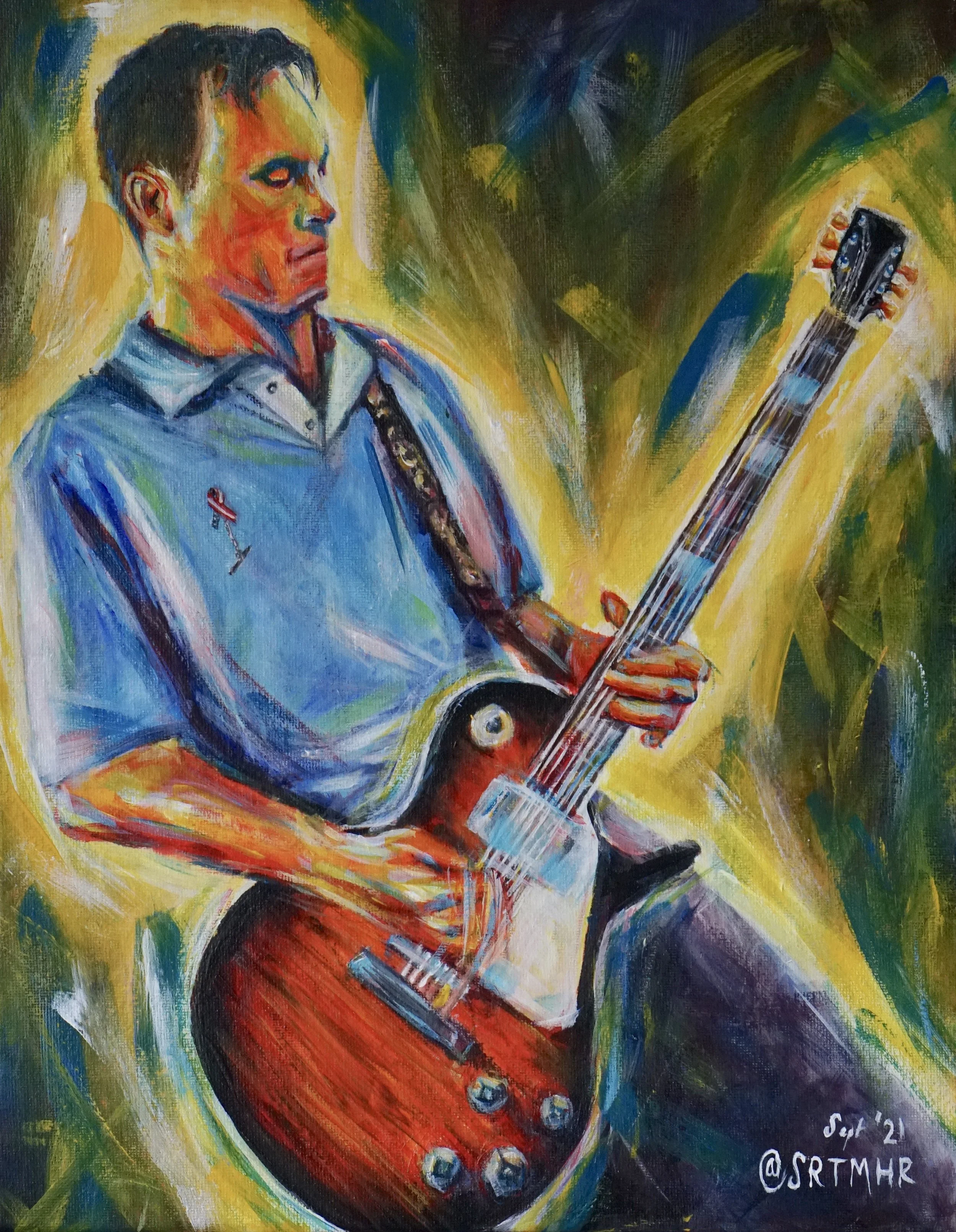 A colorful abstract painting of a man playing an electric guitar, with vibrant shades of yellow, blue, red, and green.