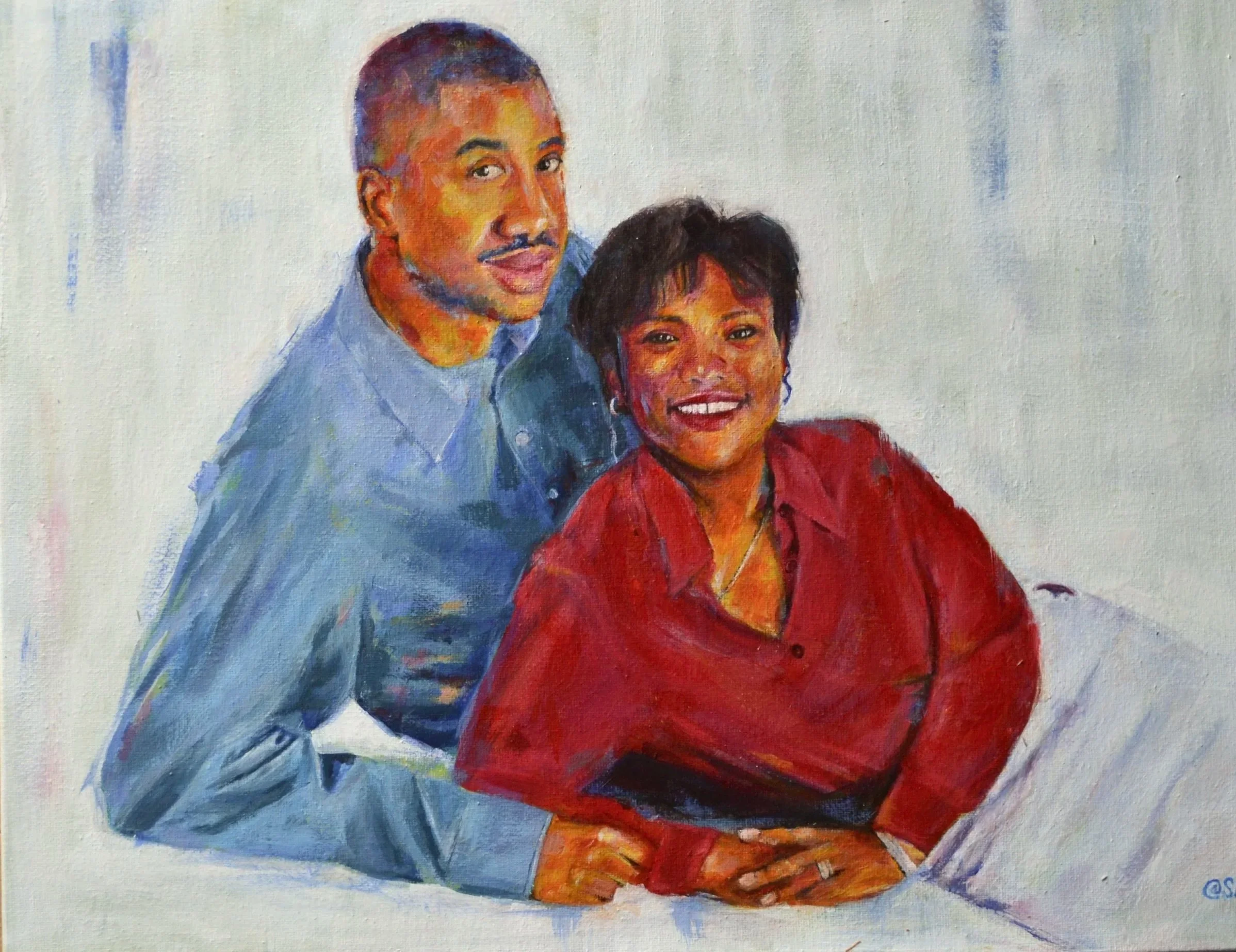 A portrait painting of a man and woman sitting together, smiling, with the man in a blue shirt and the woman in a red shirt, against a plain background.