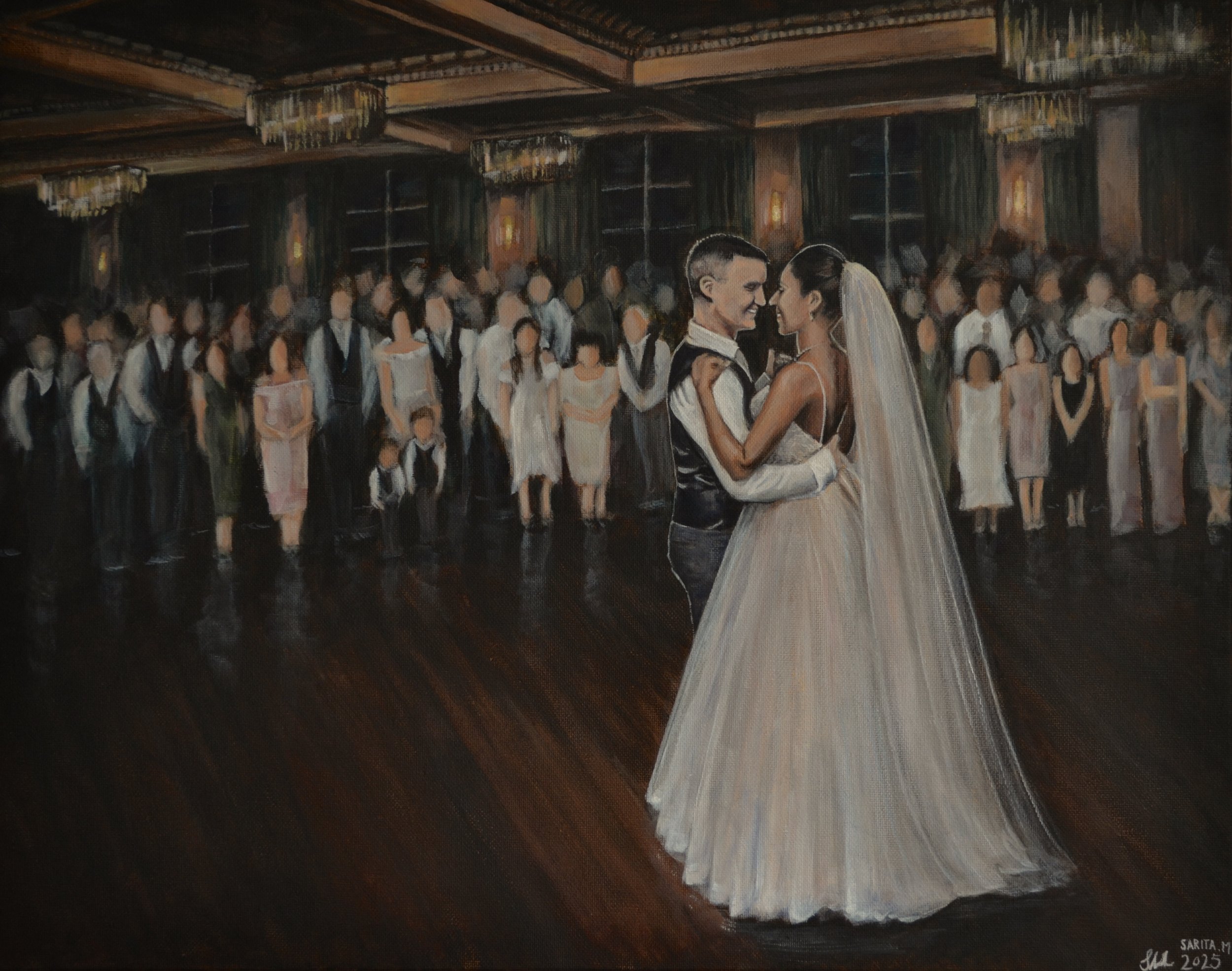 A bride and groom share a dance at their wedding reception, surrounded by a large group of wedding guests in a decorated banquet hall.