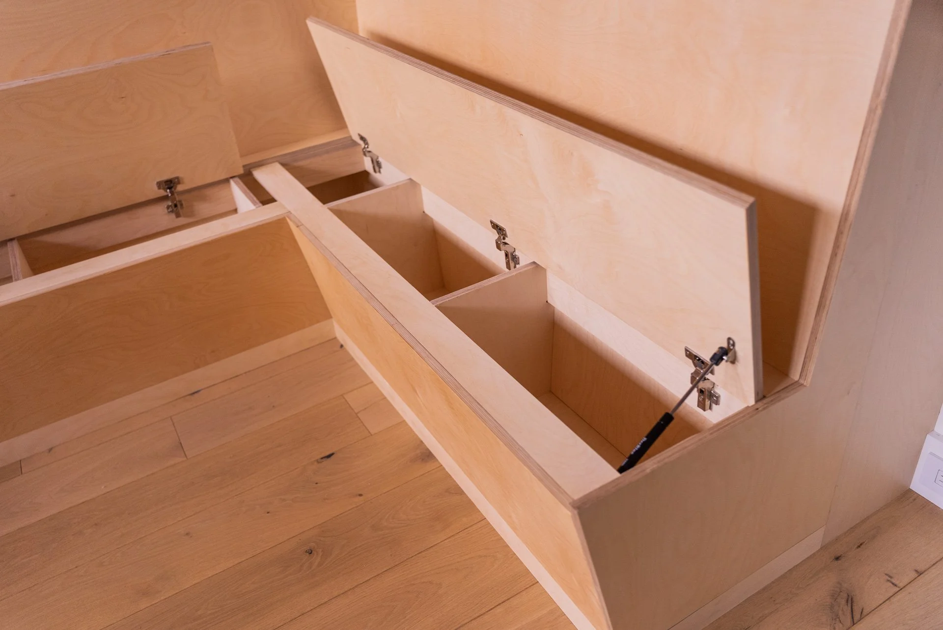 Built in banquette in Brooklyn, NY. Baltic birch plywood, with hidden storage. 