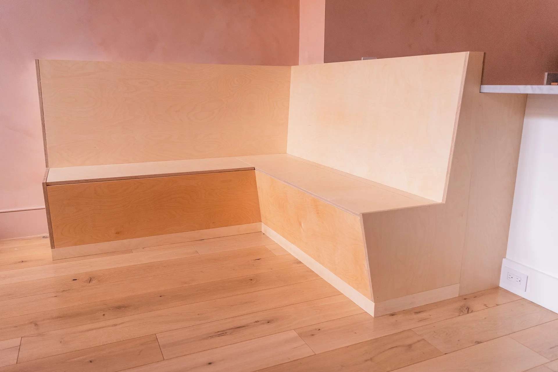 Built in banquette in Brooklyn, NY. Baltic birch plywood, with hidden storage. 