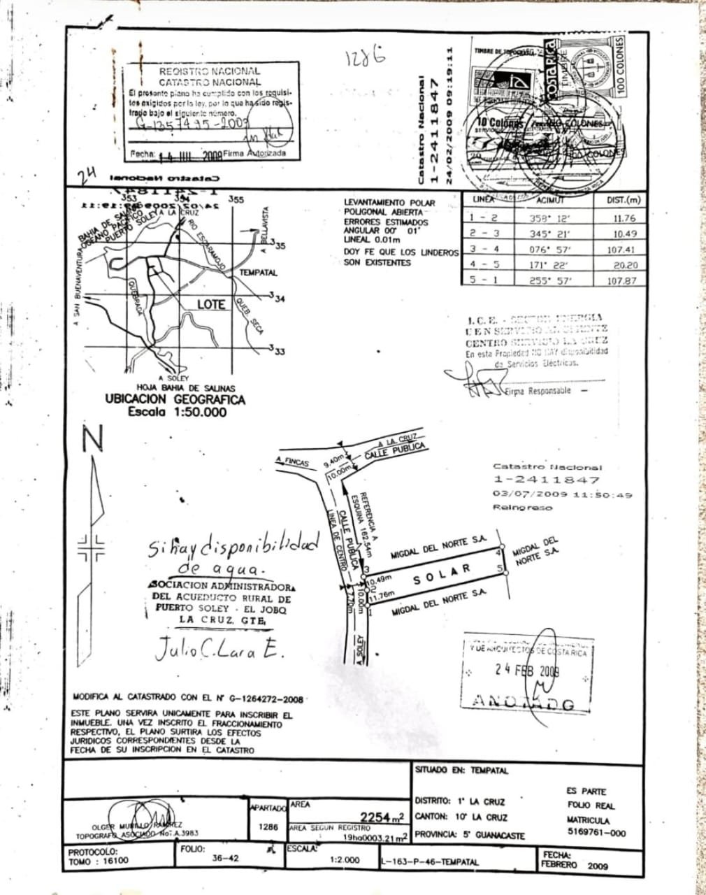 A detailed land survey map showing geographic boundaries, lot divisions, and measurements. Contains handwritten notes, signatures, and official stamps.