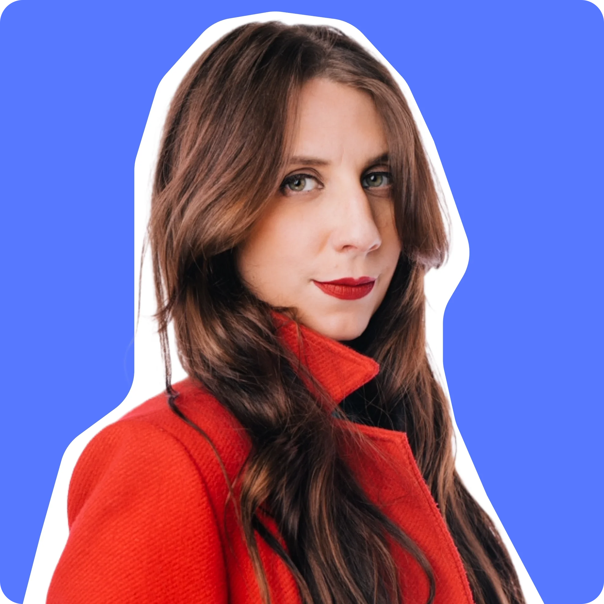 Co-founder of Brand-ish with long brown hair wearing a red jacket, portrait against a bright blue background.