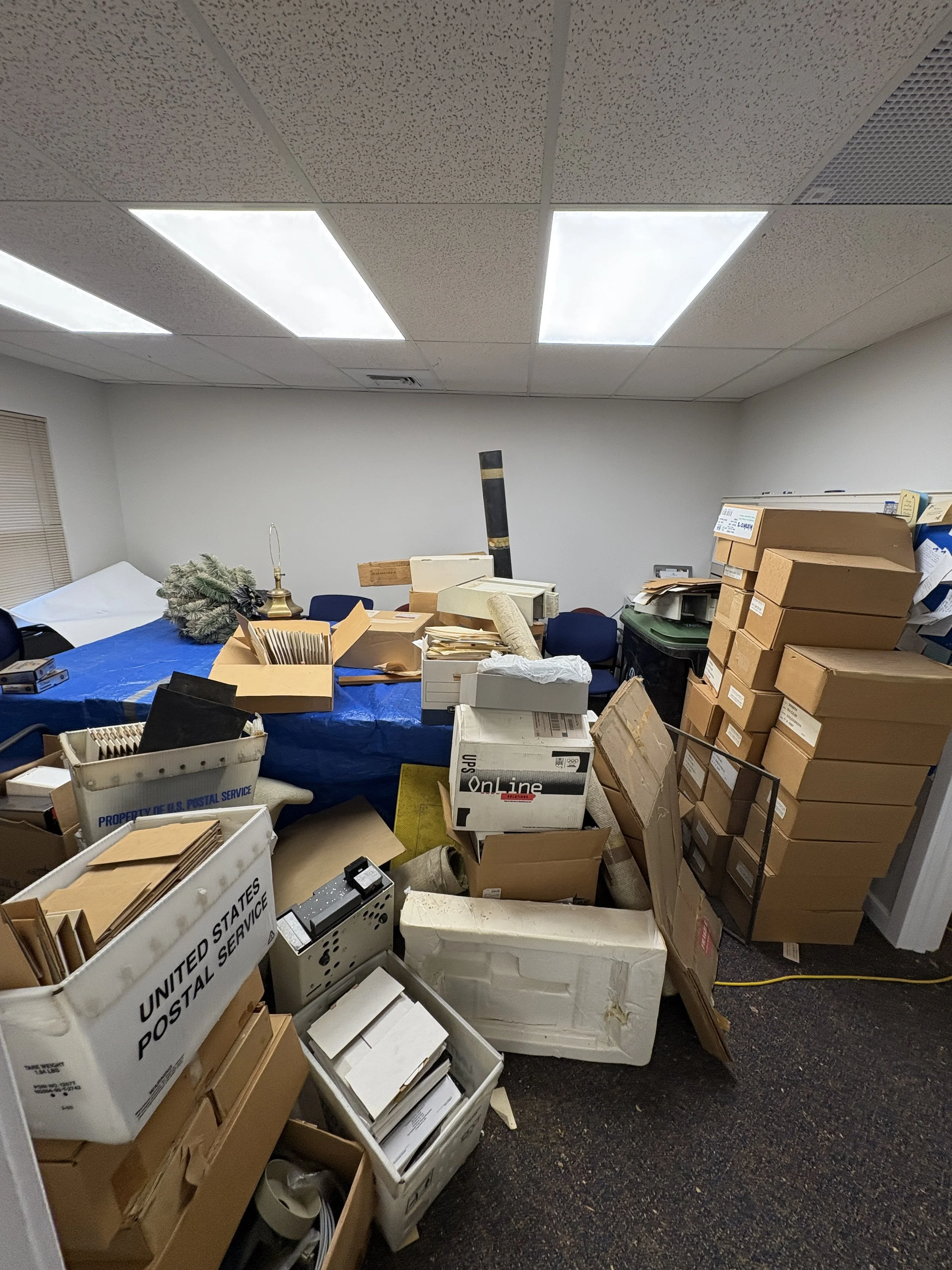 junk stacked in office in Pittsburgh, PA