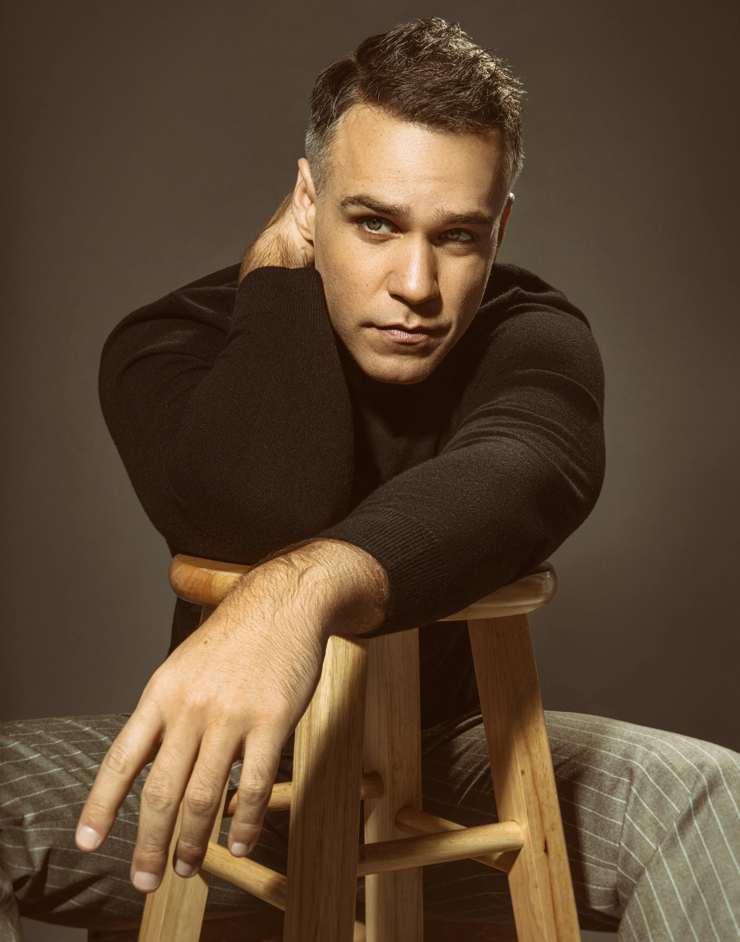 American-Greek-EU actor Taso Mikroulis Sag/aea actor in a  Brown T-shirt, grey mixed brunette 40s male