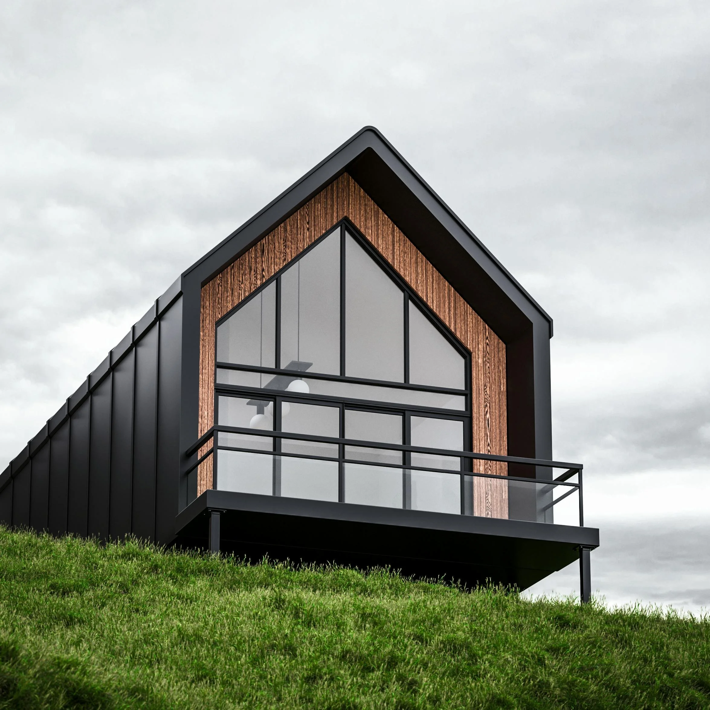 Modern house with black exterior, large glass windows, and wooden accents, situated on a grassy hillside under a cloudy sky.