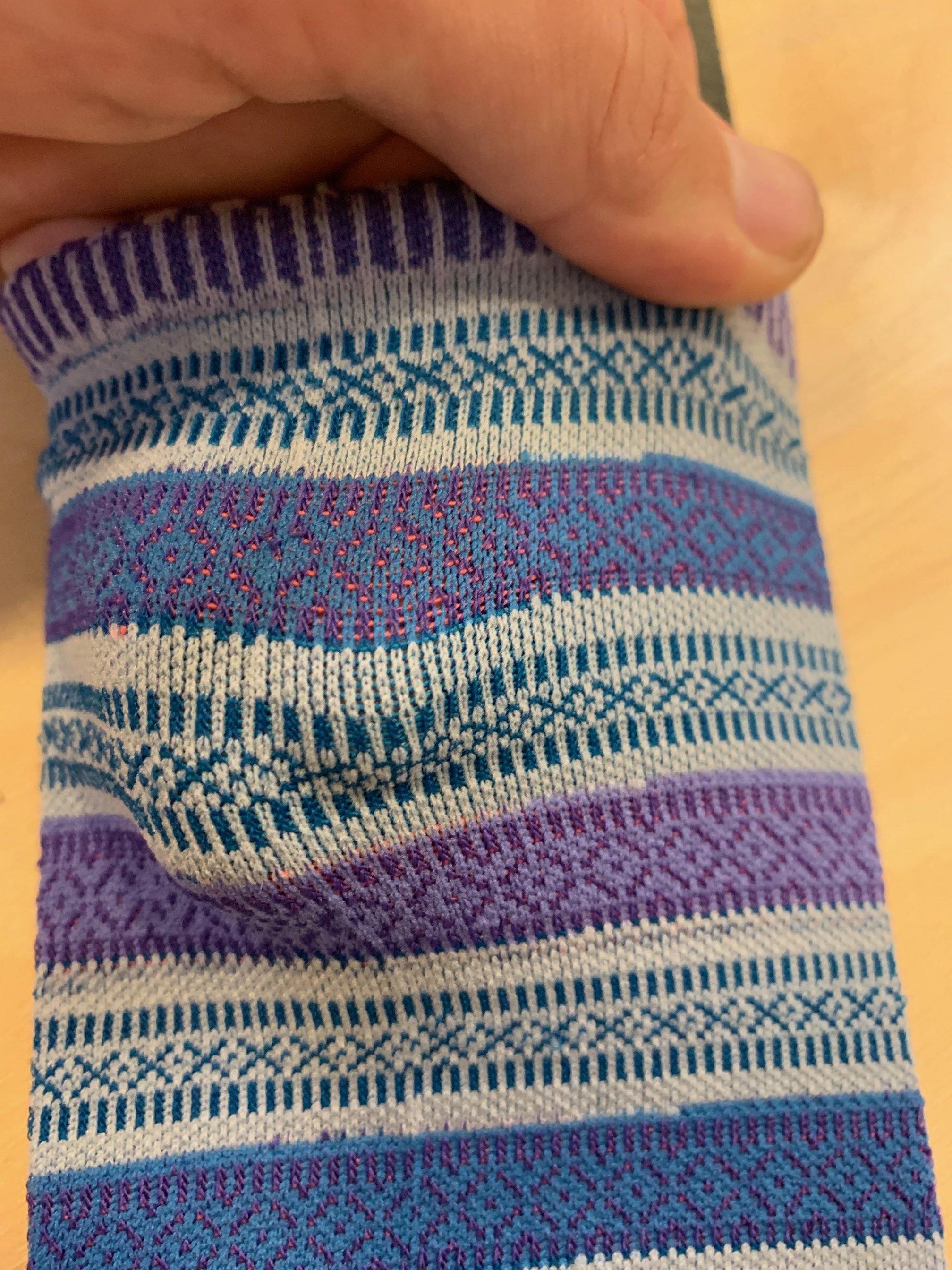 This is a simple mesh or drop needle patterns inside of stripes, the real magic is the plating yarn, and elastic yarn change at every stripe. Thats why you see 3 colors in the purple stripe, and 3 colors in the grey stripe. So much potential to explo